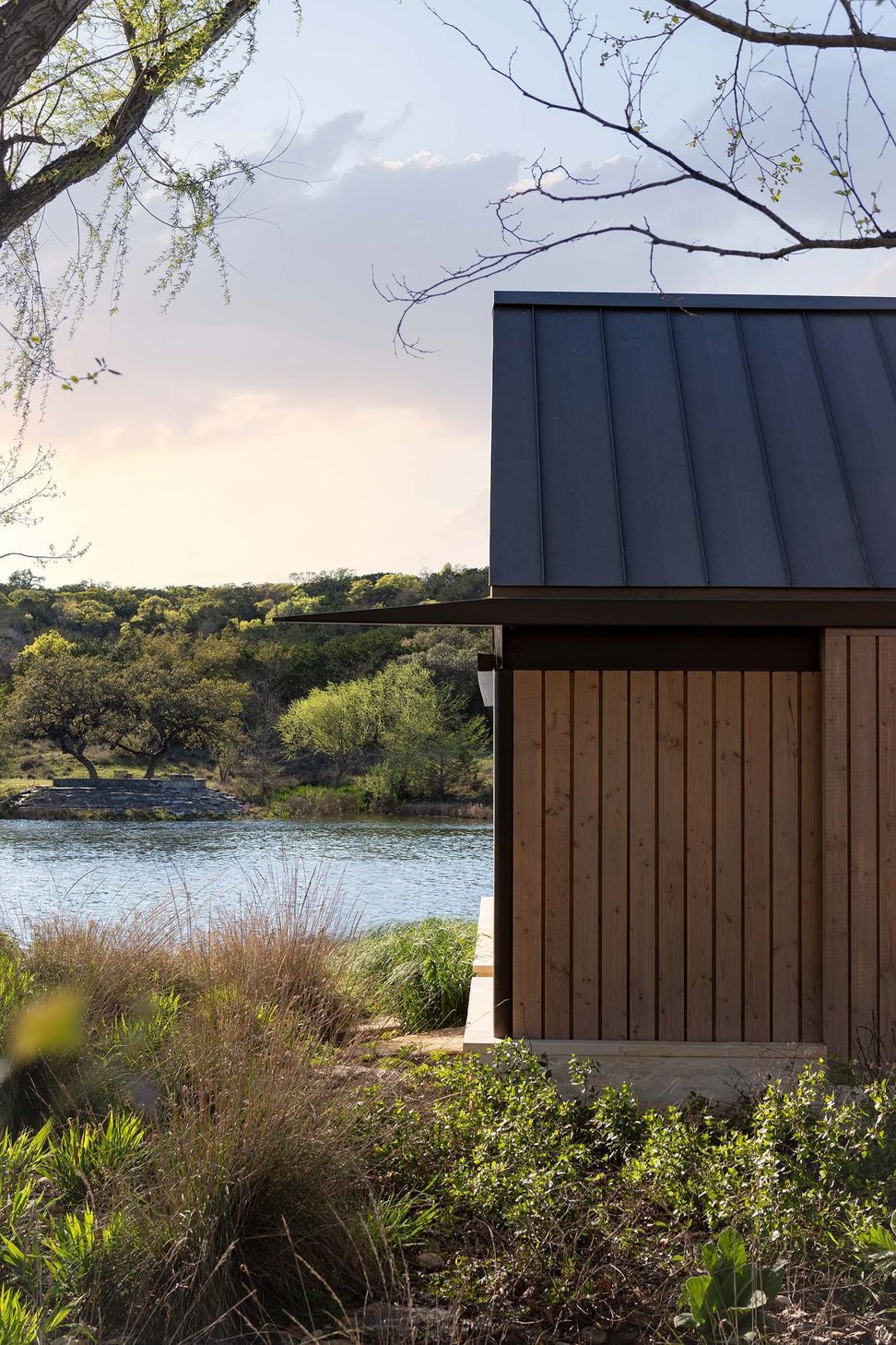 13RanchRecreationCuppettKilpatrickArchitectureandInteriorDesignaustin-tx-lake-pavilion-boat-dock-sunset.jpg