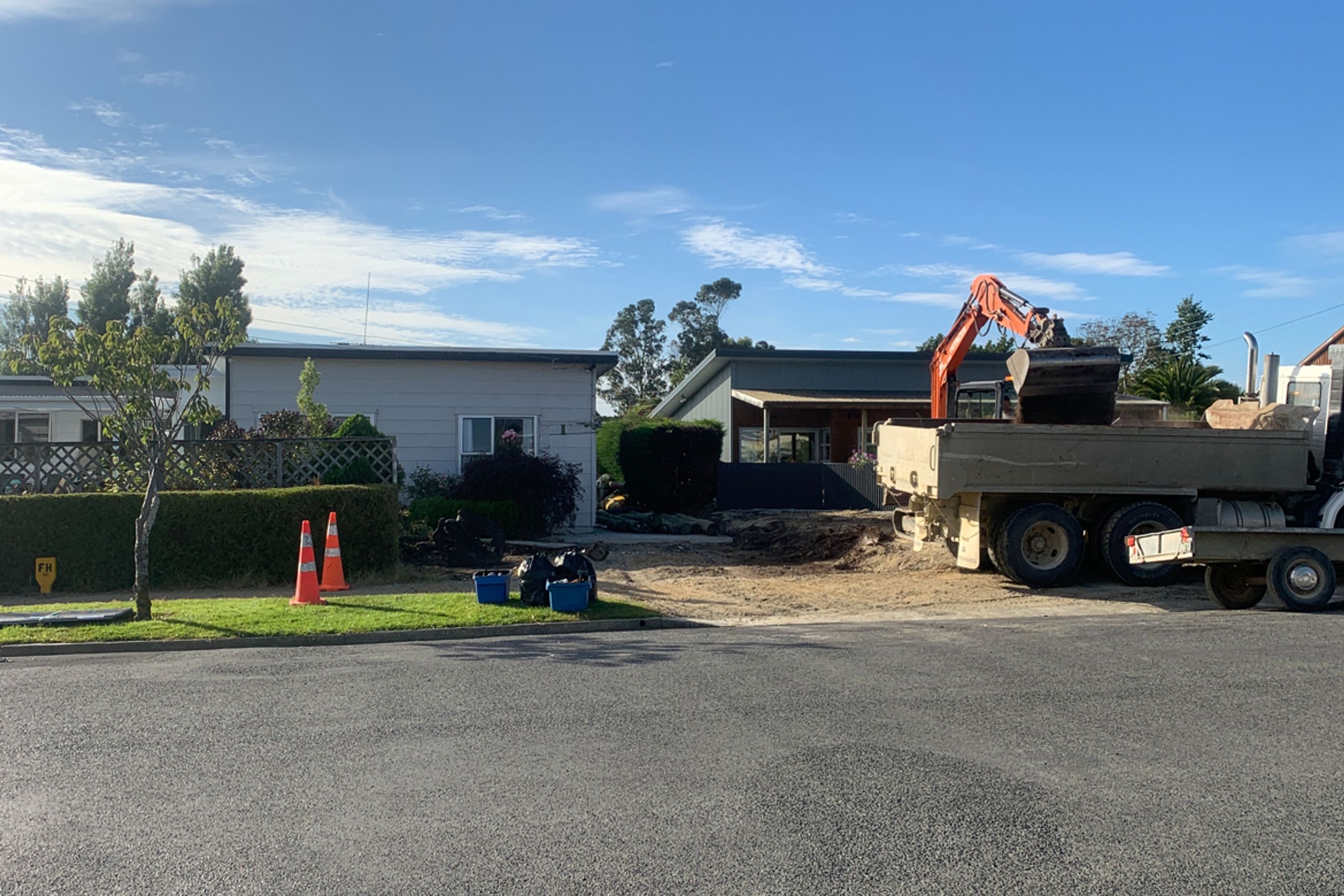 Old carport demolished and removed, site preparation