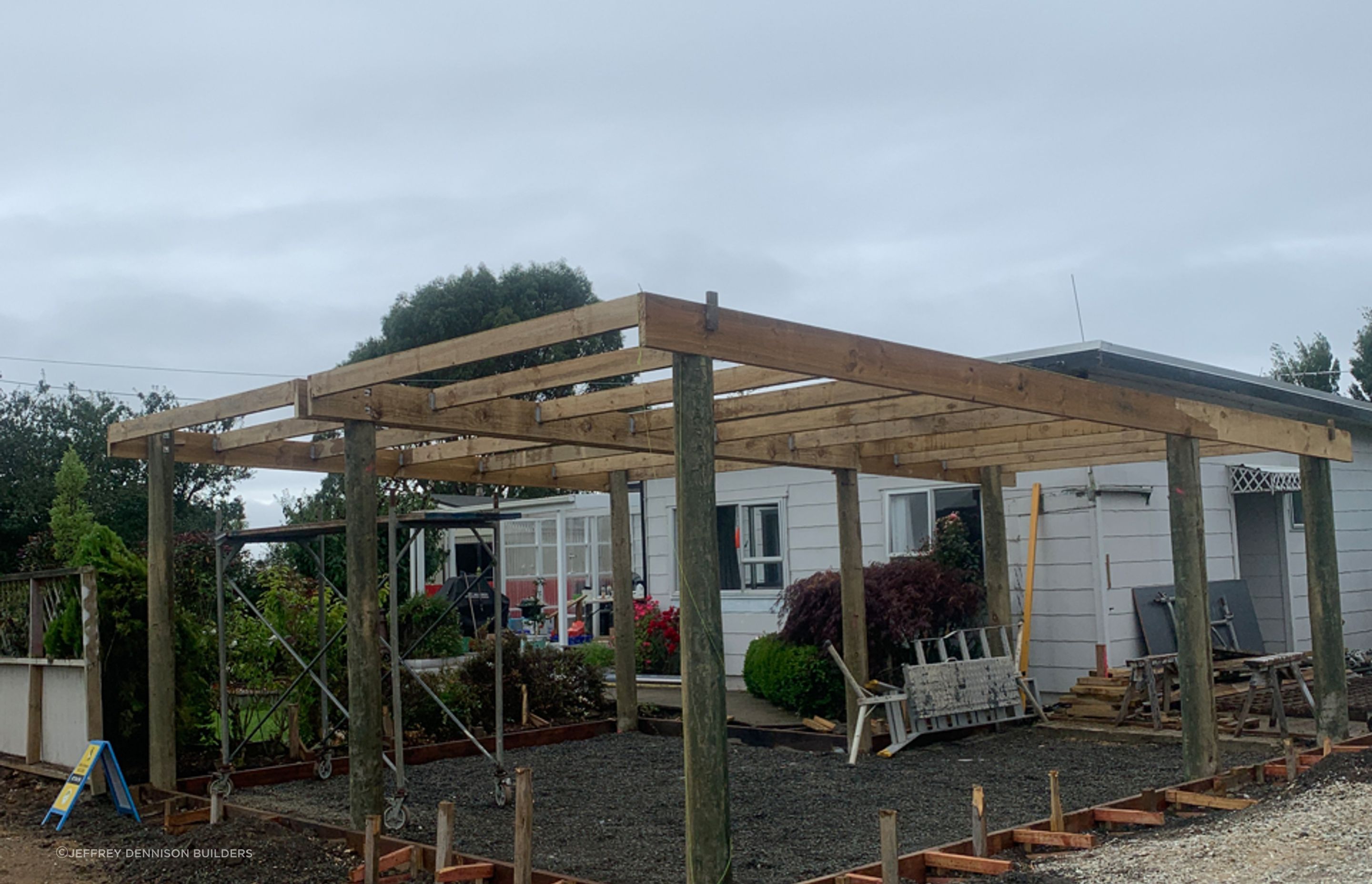 Roof framing going up