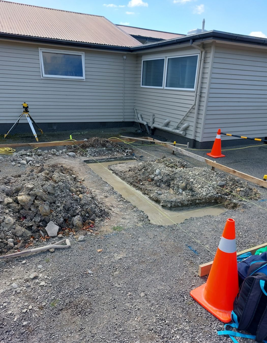 Concrete poured and floated for one of the foundations