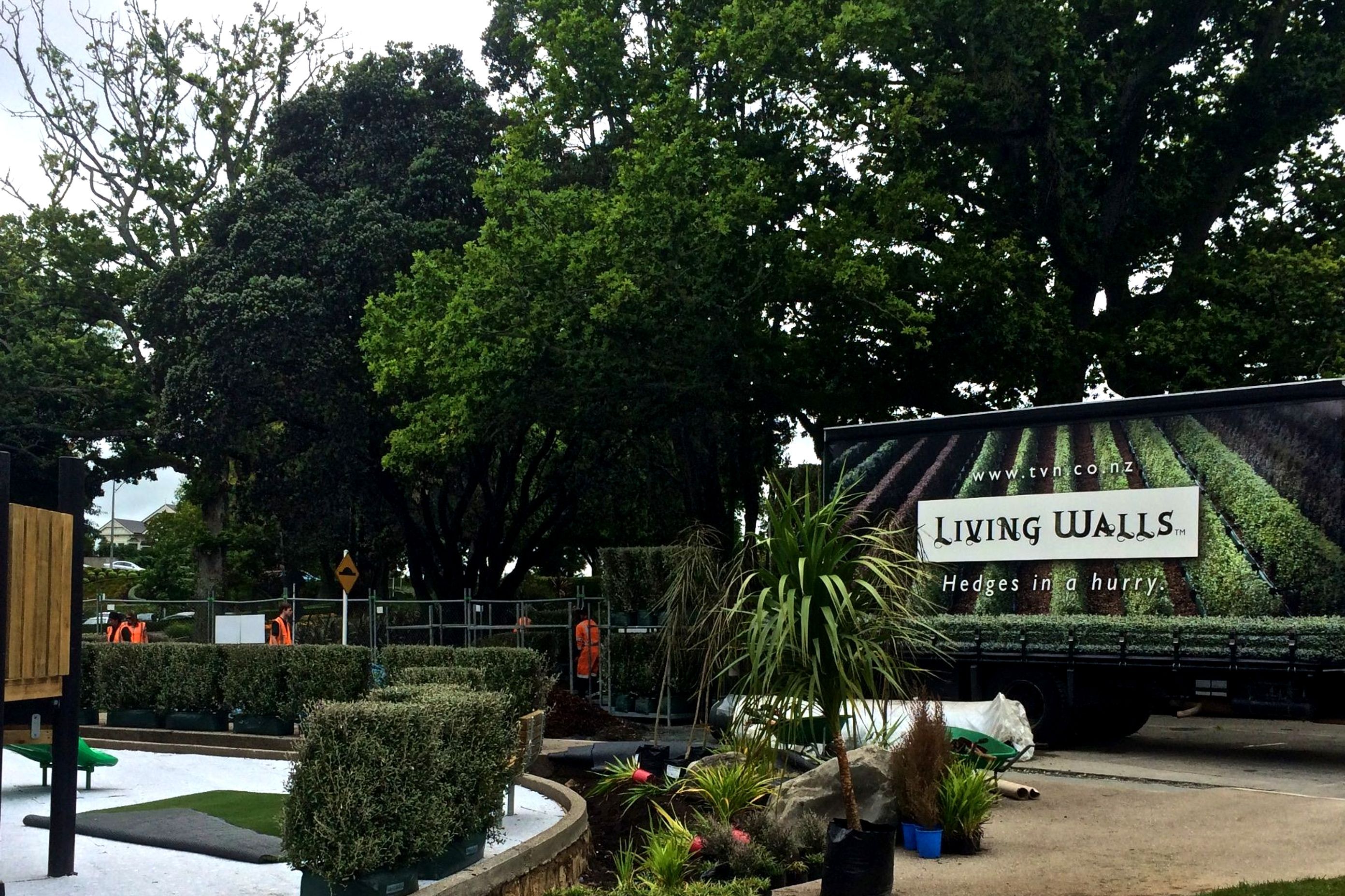 Living Walls™ instant hedges form the safety enclosure for the child space. Straight or curved hedging...no problem!