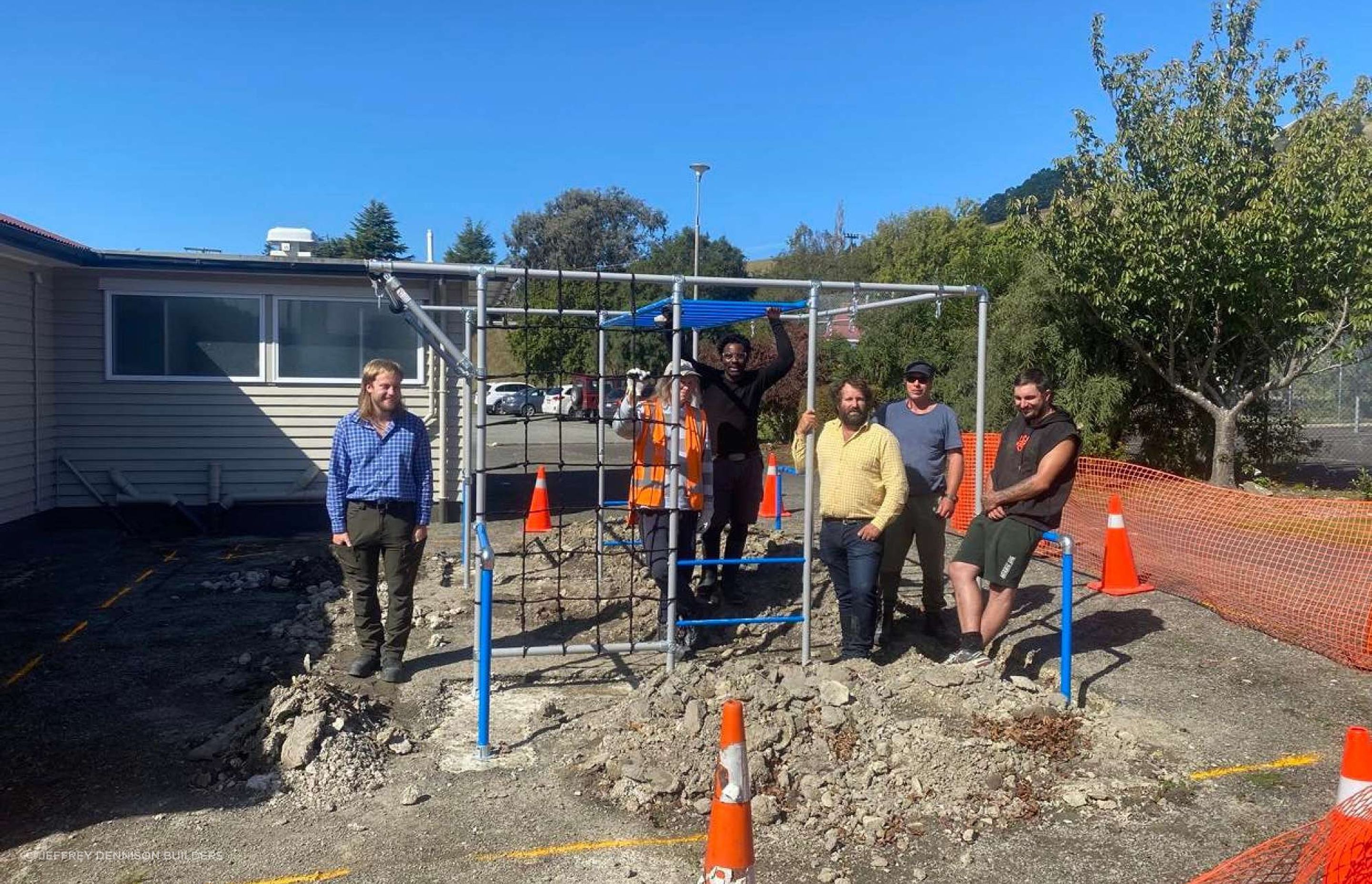 Photo of the JD Builders team: Regan (Quantity Surveyor), Jeff in the yellow shirt (CEO &amp; Master Builder), Elizabeth, Patrick, Phil &amp; Nick (Carpenters)