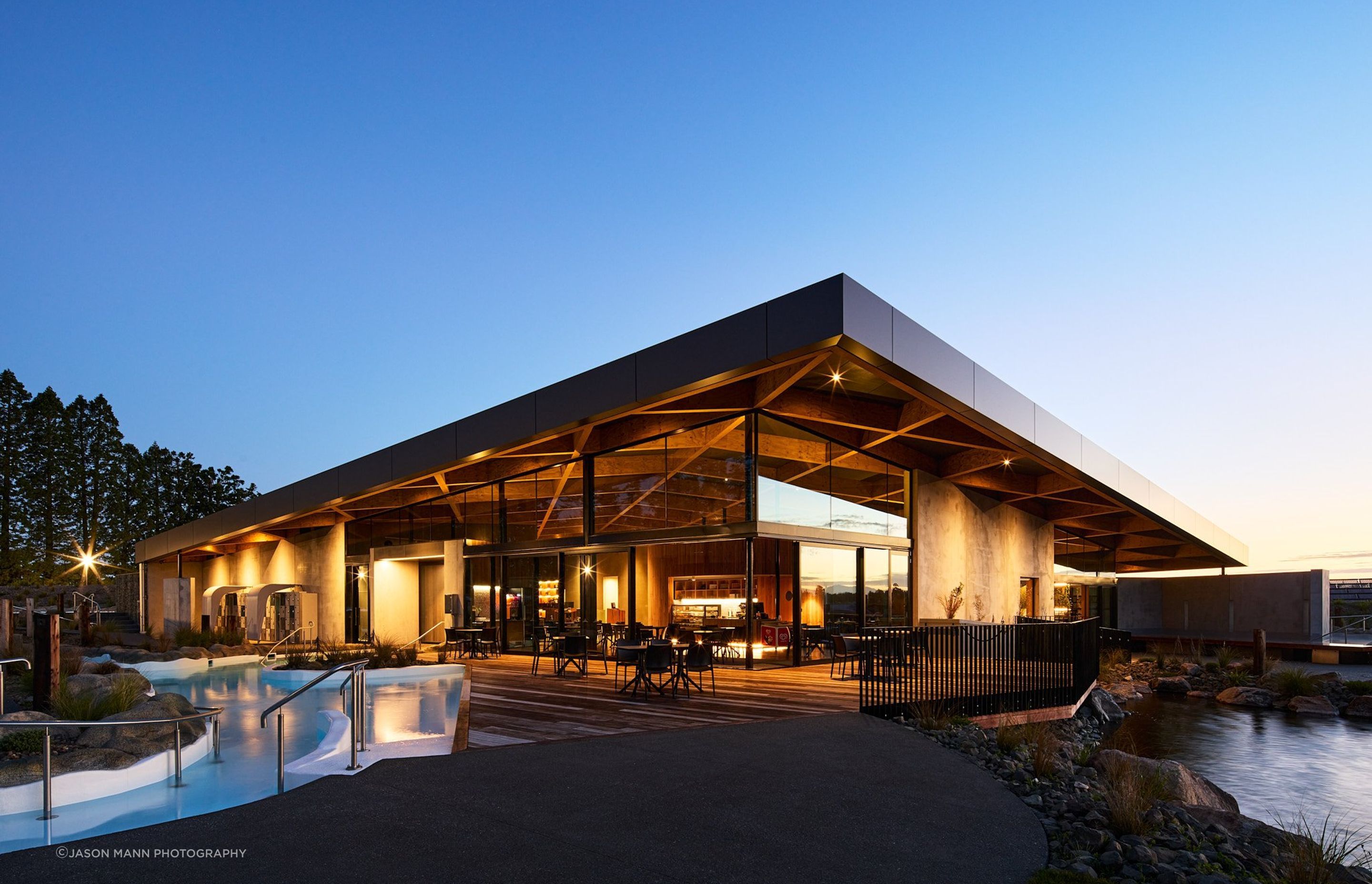 The view from the rear of the complex highlights the beautiful timber structure of the facility's roof.