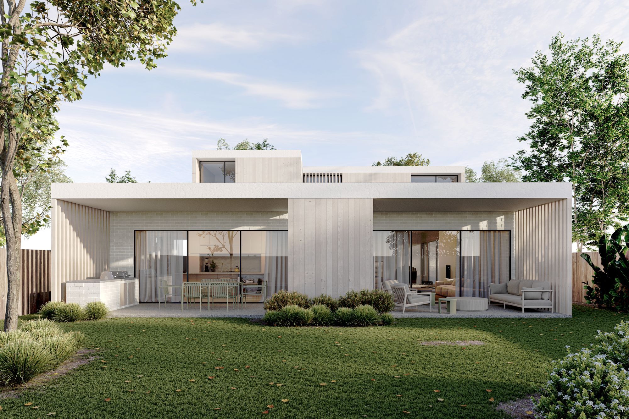 A clever extension to the internal living spaces, the entertaining area to the back of Cantilever House extends the length of the home and is accessed through sliding glass doors. Cool and shaded beneath a vast awning, the area is bathed in natural light via a central opening. Fitted with an inbuilt BBQ, the back patio is an idyllic space for entertaining or relaxing.