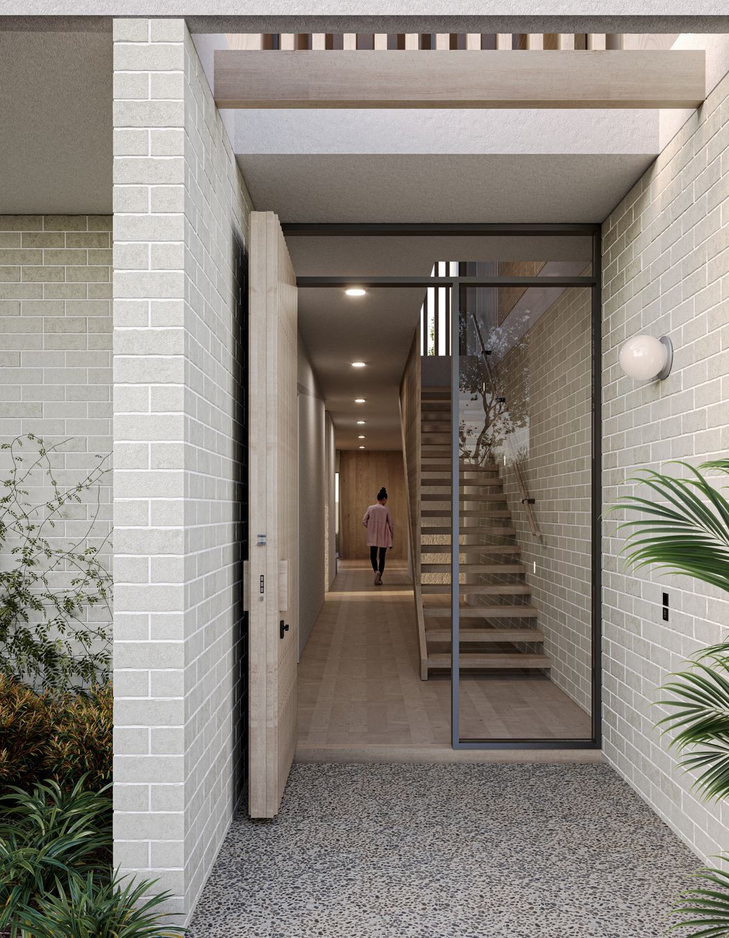  Bordered by light concrete brick walls, Cantilever’s entrance ushers natural light into the home via an open roof structure that compliments the entry. To the right, a double fronted garage hides discretely behind a pale timber façade, slotting carefully into the design of the built form.