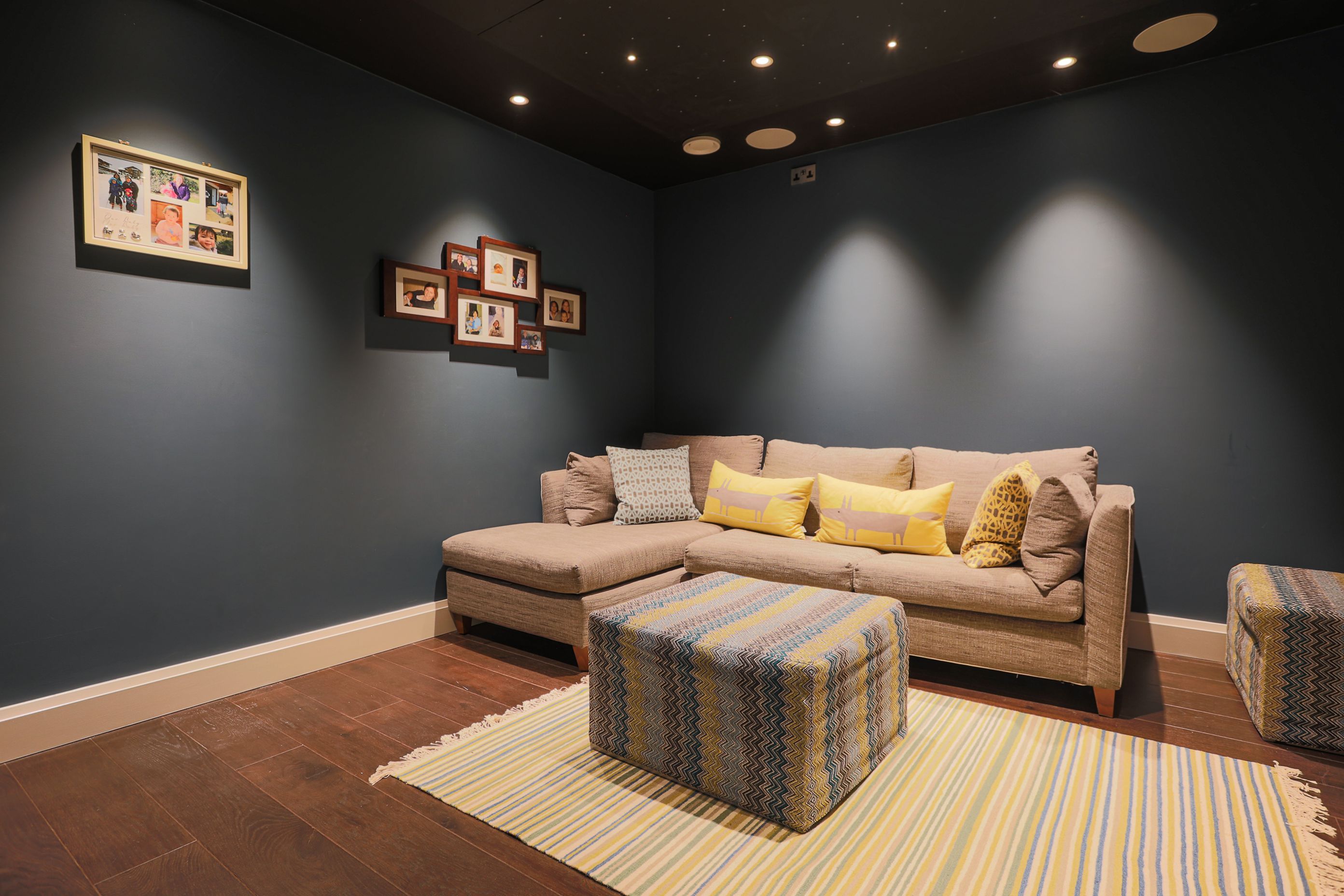 A teenage hangout, media room and sleep over space. The sllep stools fold out into extra beds.