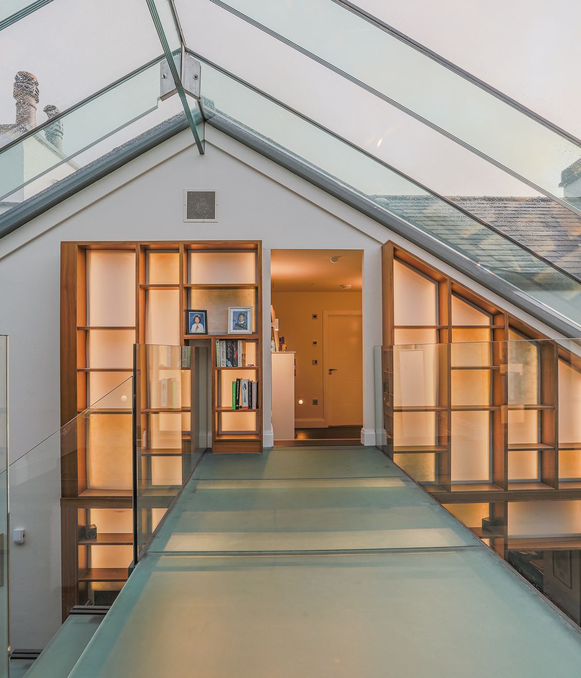 The glass overhead walkway connects the old and new pavillions.