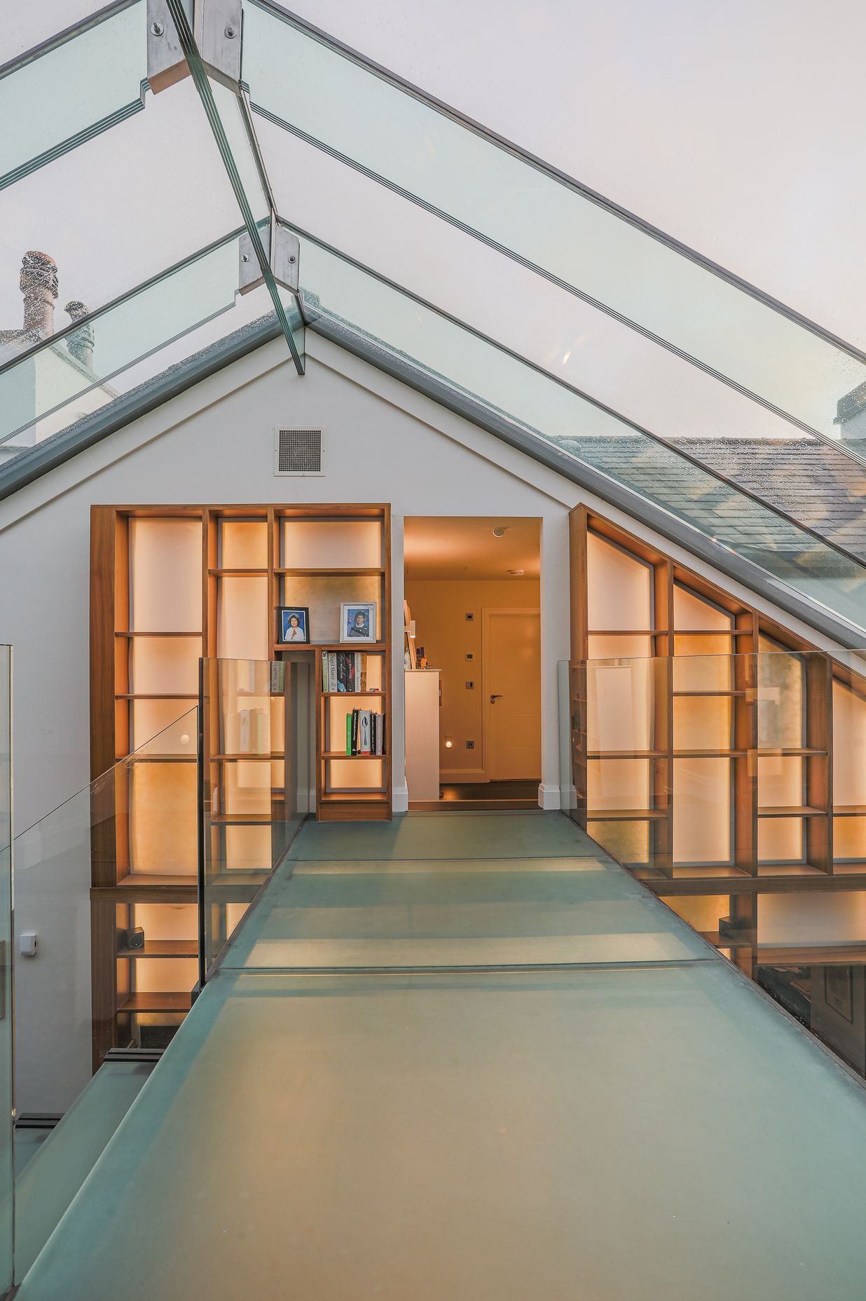 The glass overhead walkway connects the old and new pavillions.