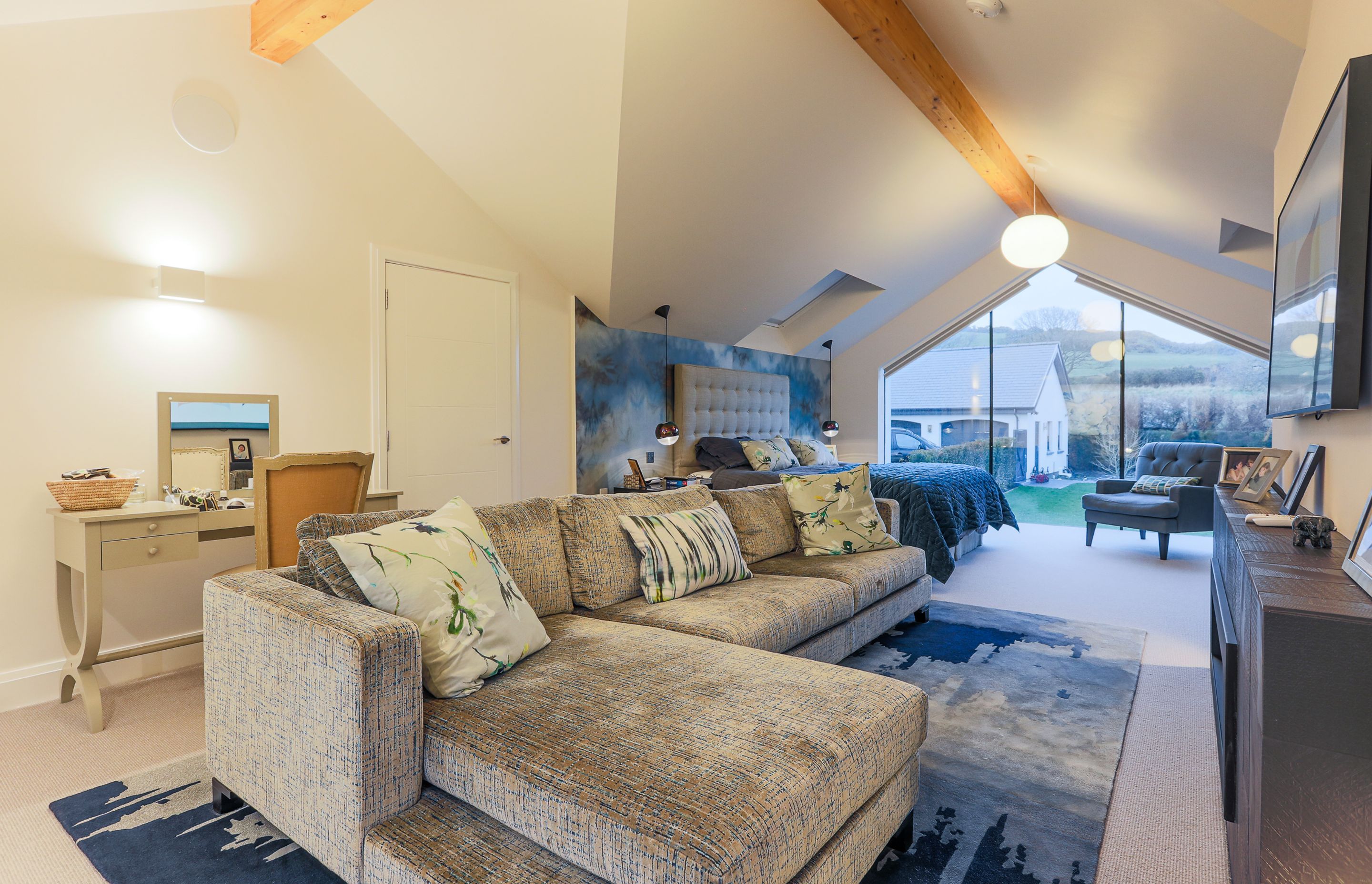 The Master bedroom was designed as a retreat for adults, with it soothing moody blue palette.