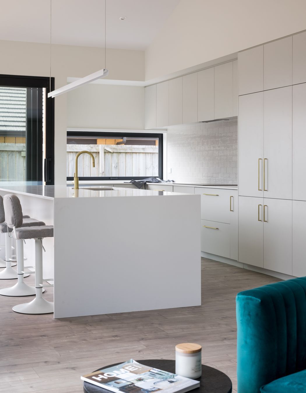 The large kitchen island bench is perfect for entertaining guests.