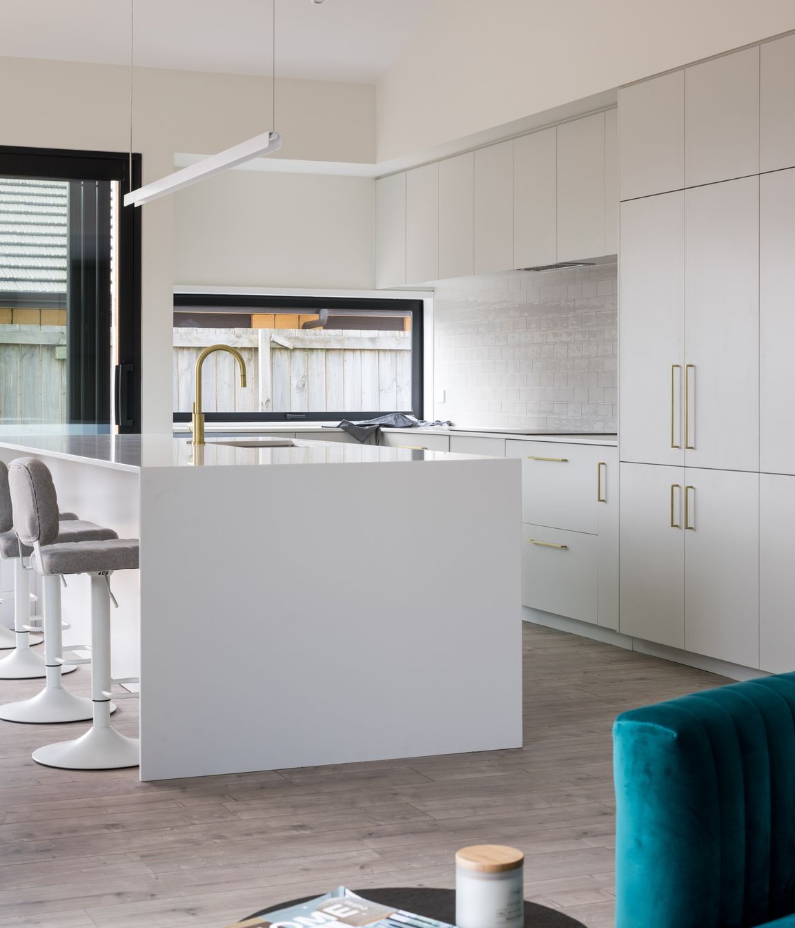 The large kitchen island bench is perfect for entertaining guests.
