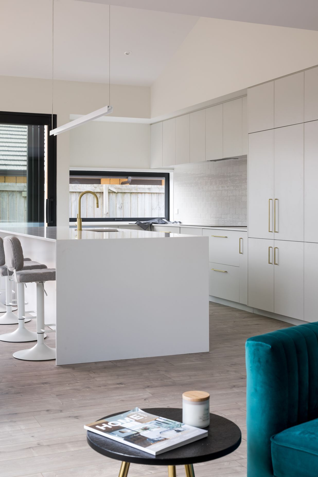 The large kitchen island bench is perfect for entertaining guests.