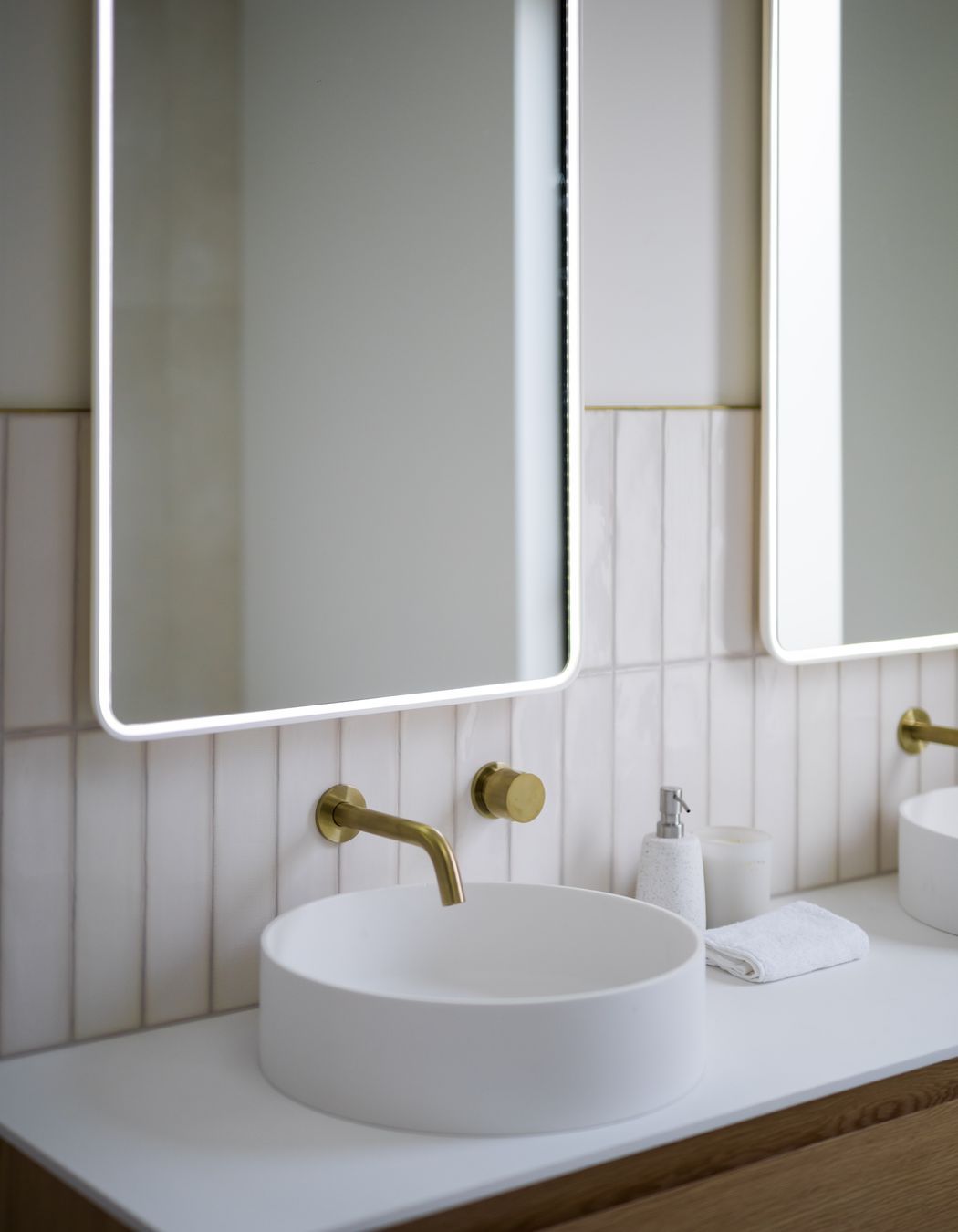 The home's elegant detailing is the work of Kae Interior Designs.