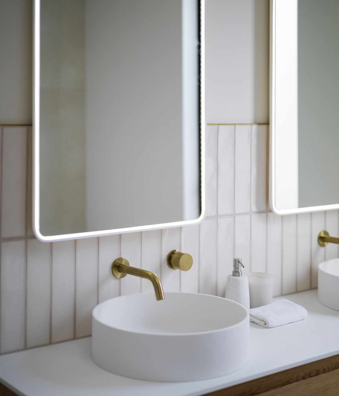 The home's elegant detailing is the work of Kae Interior Designs.