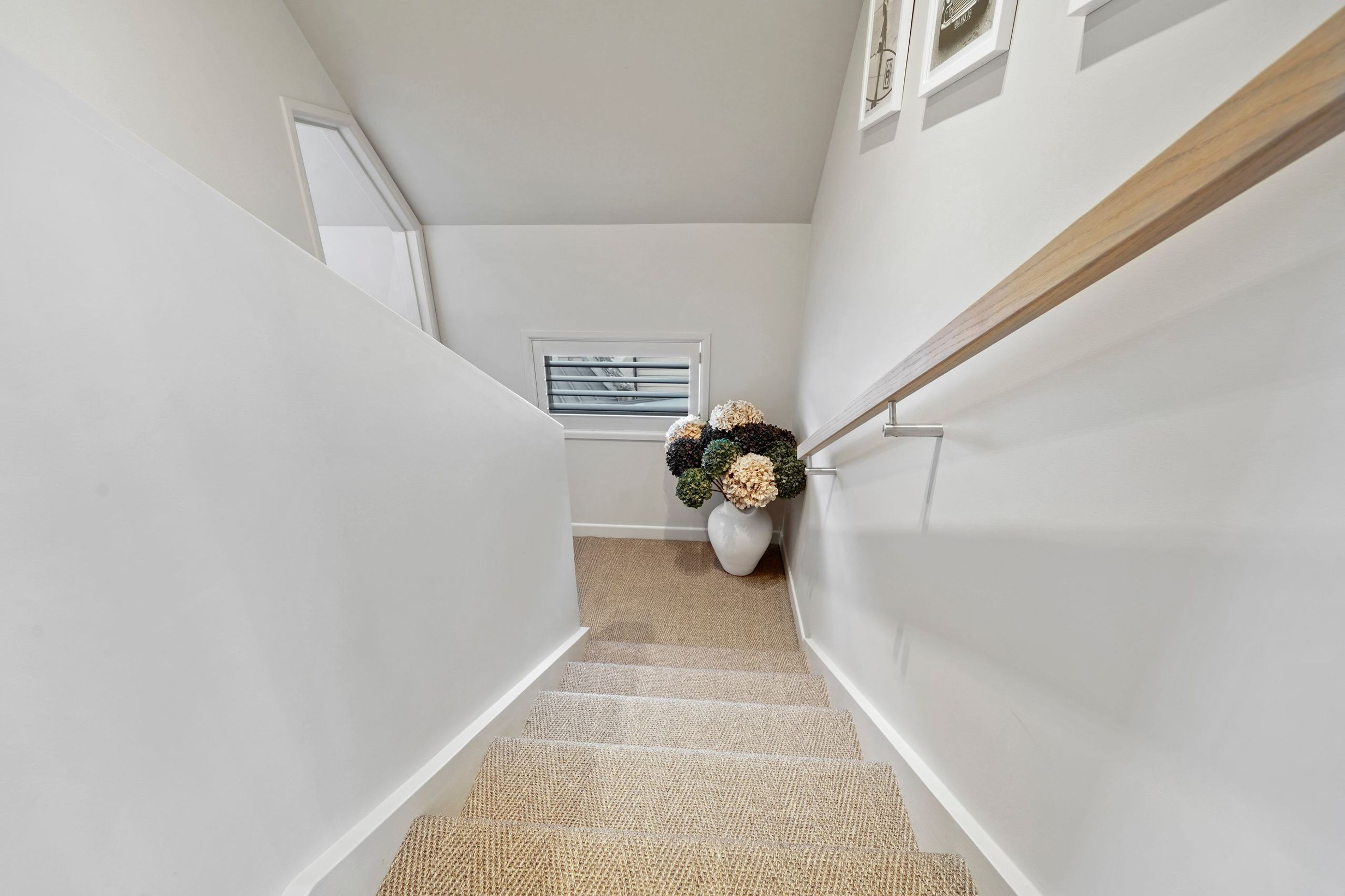 Transitions should feel effortless. We designed this stairwell to flow naturally, subtle lighting, clean lines, and a finish that ties the whole level together.