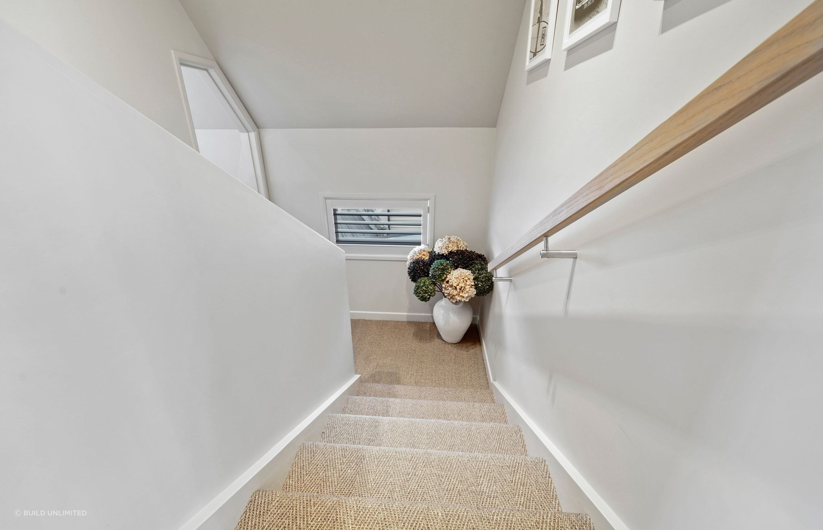 Transitions should feel effortless. We designed this stairwell to flow naturally, subtle lighting, clean lines, and a finish that ties the whole level together.