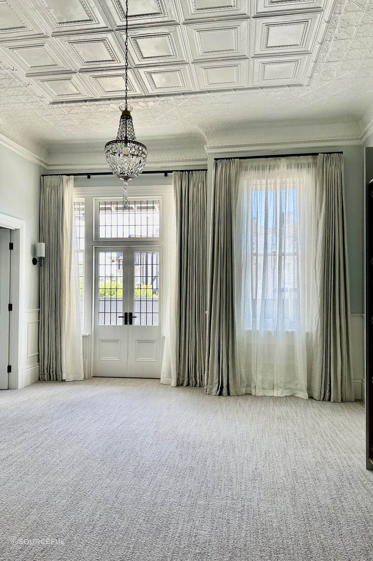 Primary Bedroom featuring automated rods, linen sheers and linen drapes