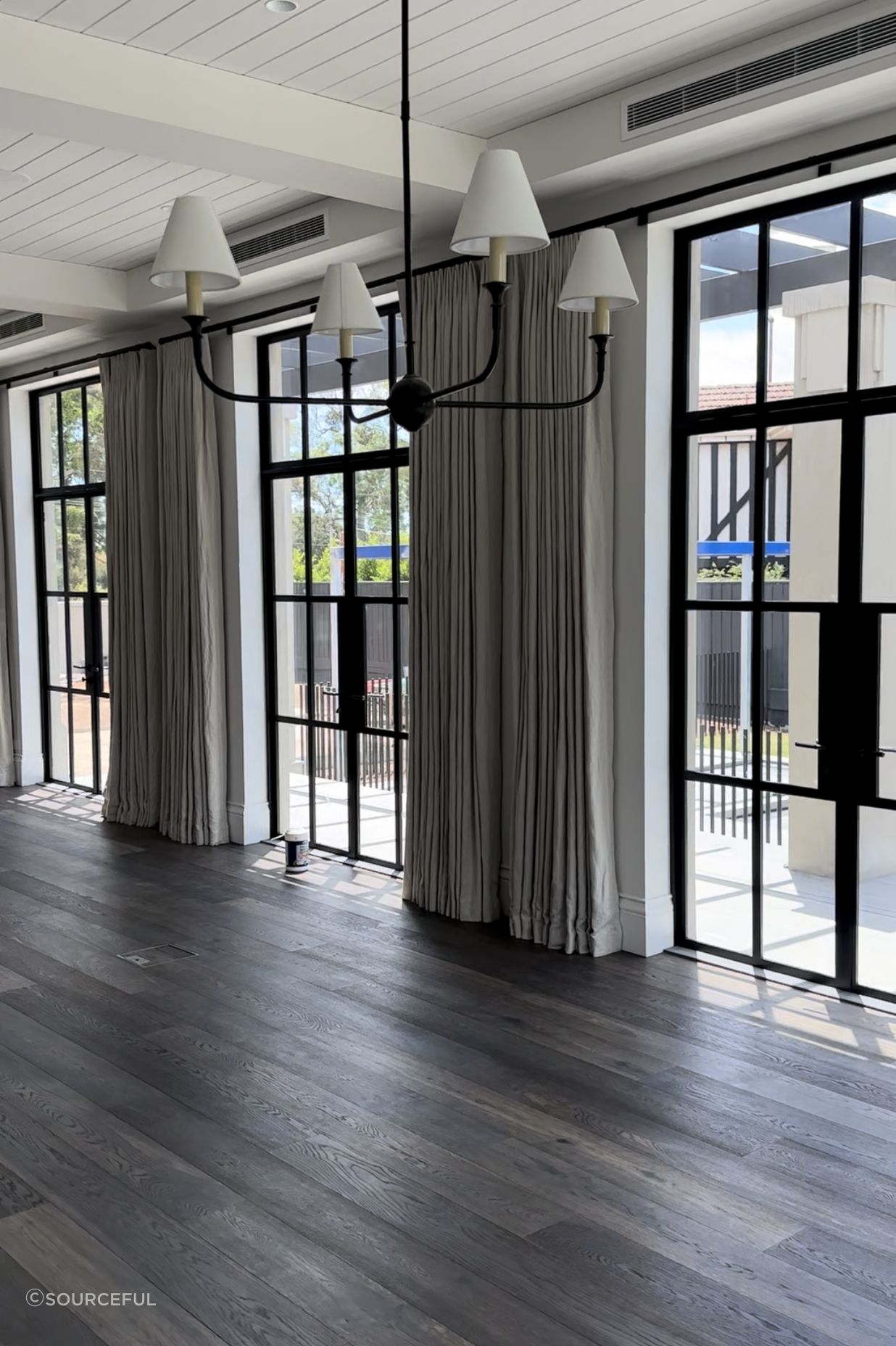 Living room - Featuring automated rods and linen drapes