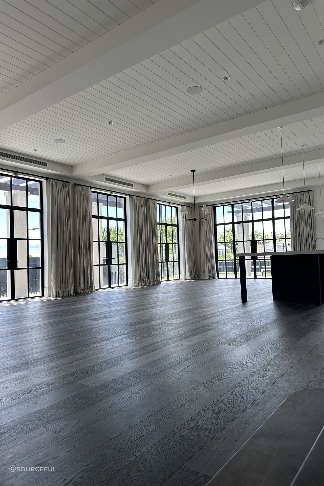 Living room - Featuring automated rods and linen drapes