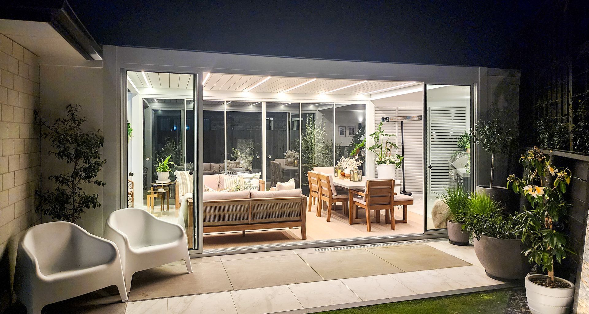 Custom Louvred pergola + Glass Sliding Door + Shutter Wall banner