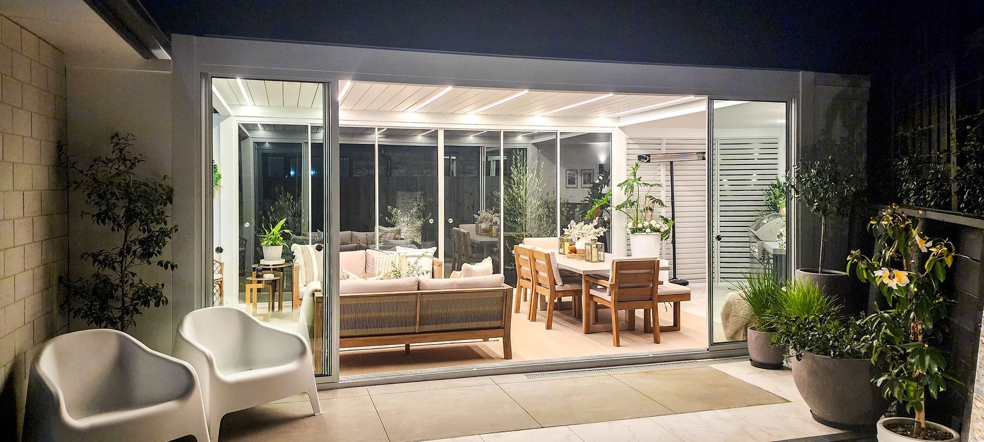 Custom Louvred pergola + Glass Sliding Door + Shutter Wall banner