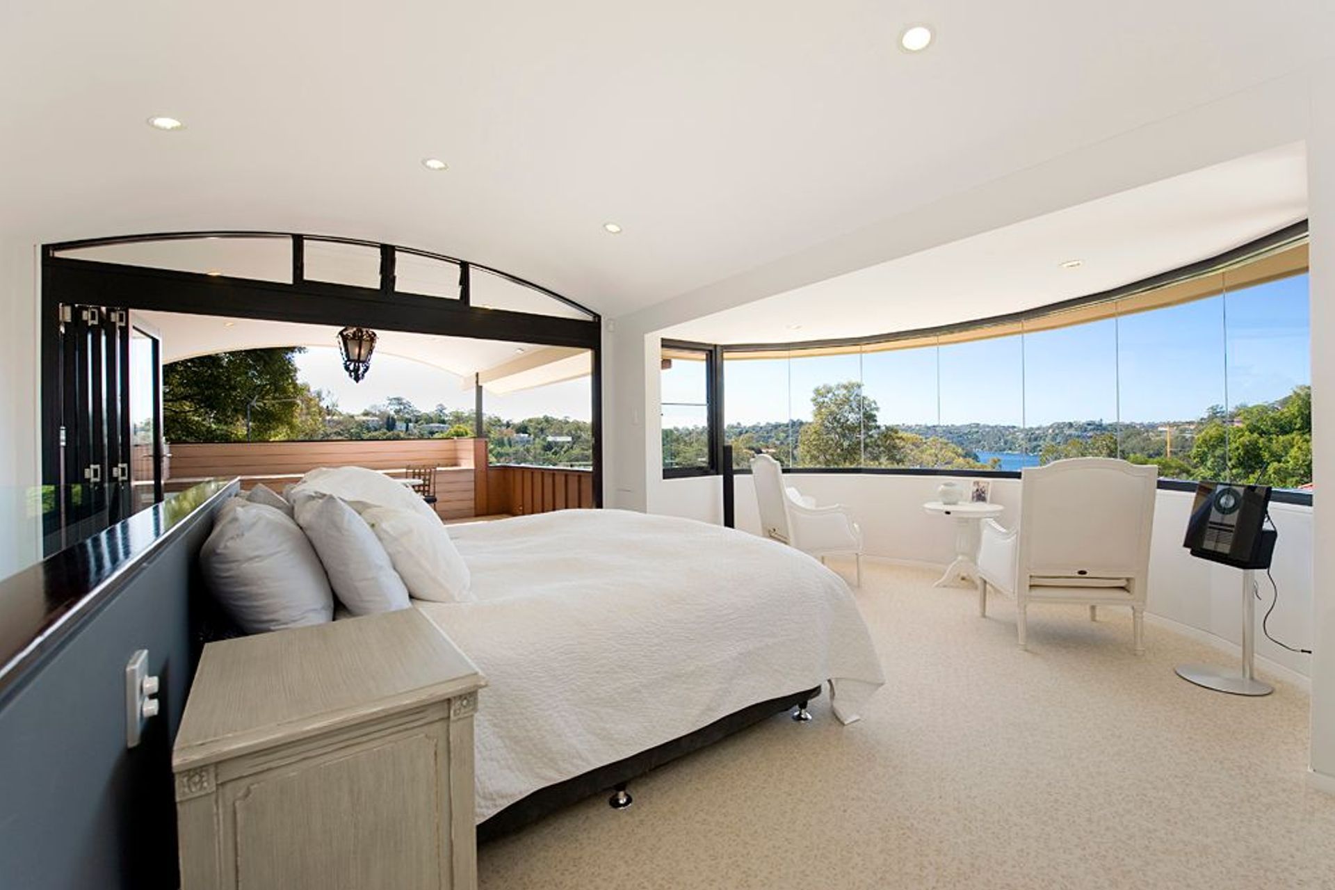 Looking out through bay window and to water views beyond