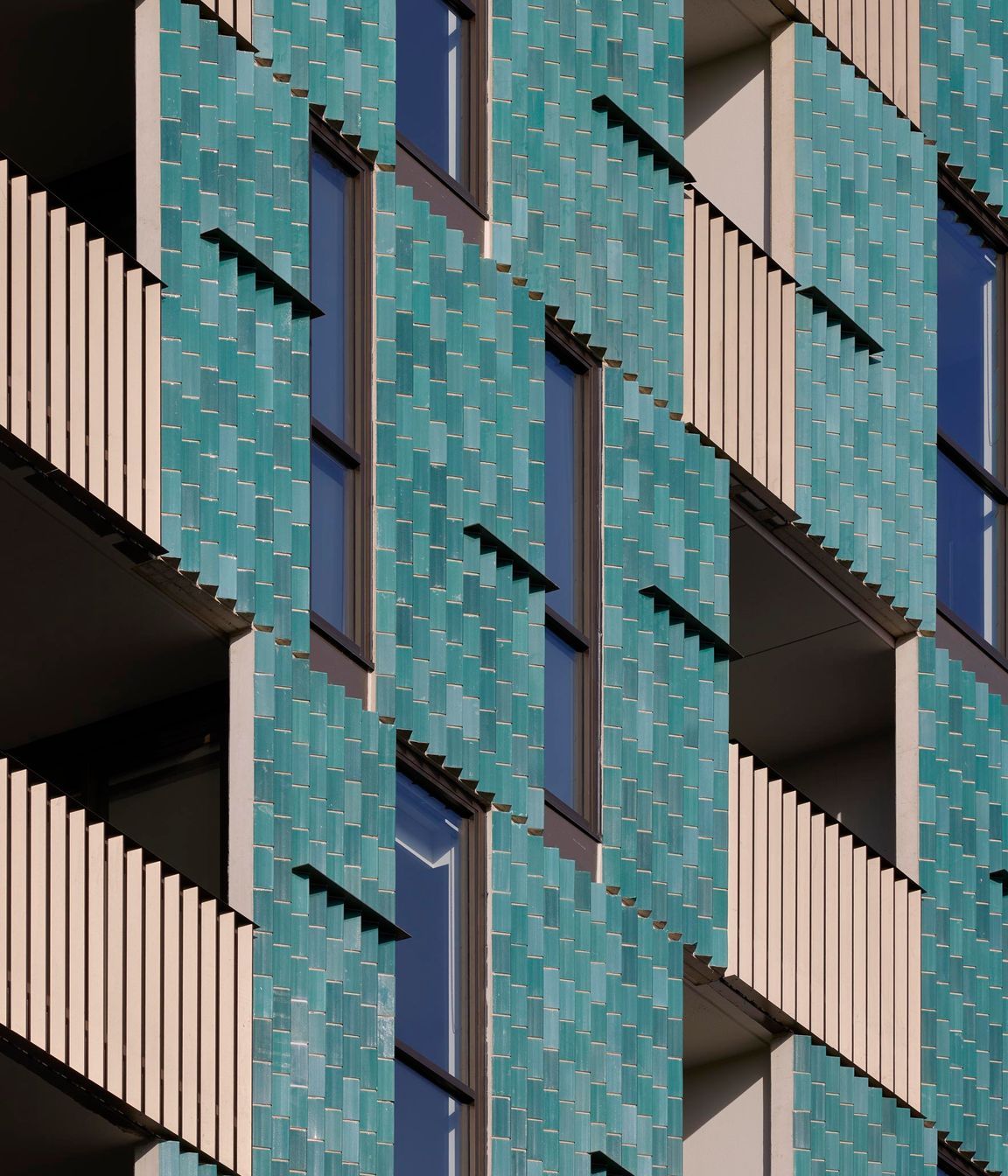 Brick-Inlay-ig-zag-facade-Tan-Tat.jpg