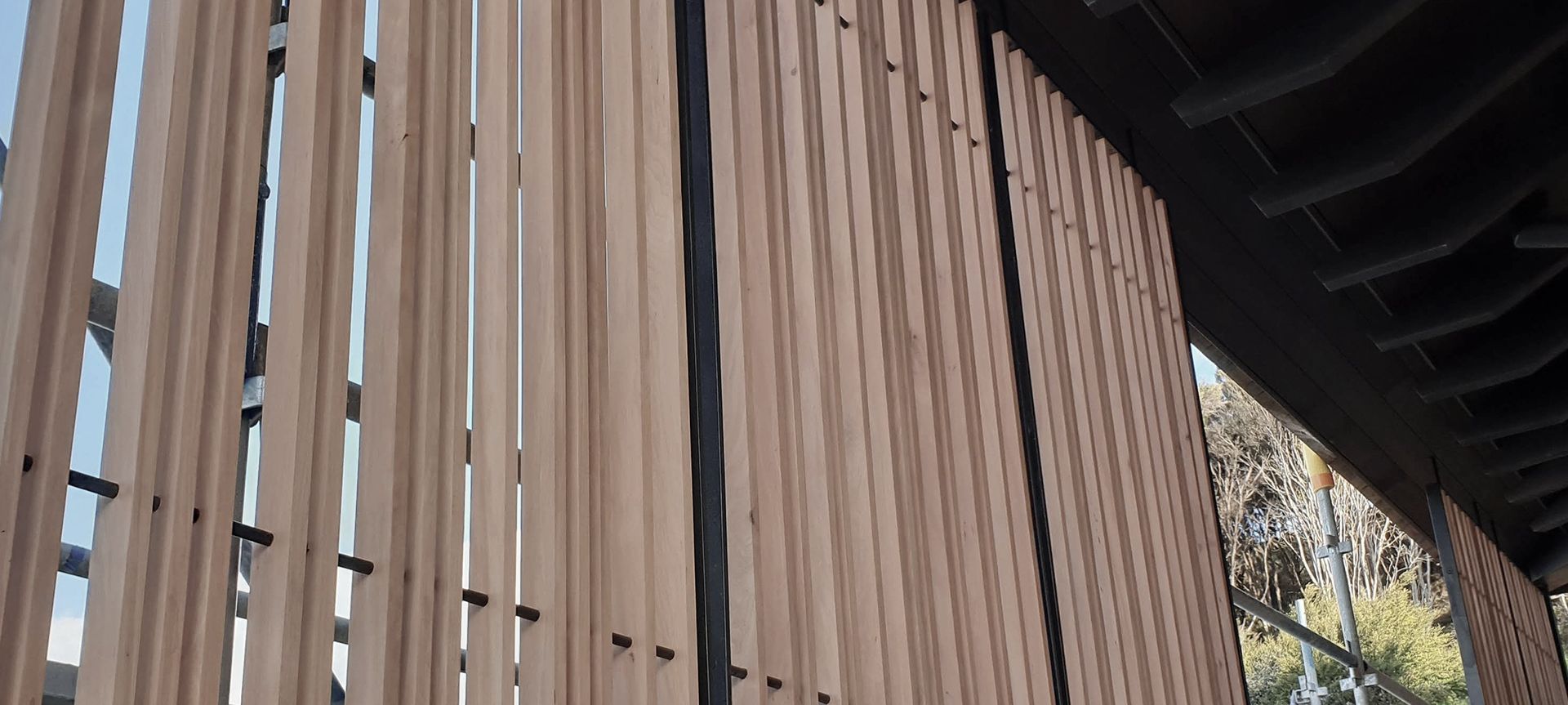 Decking with privacy wall banner