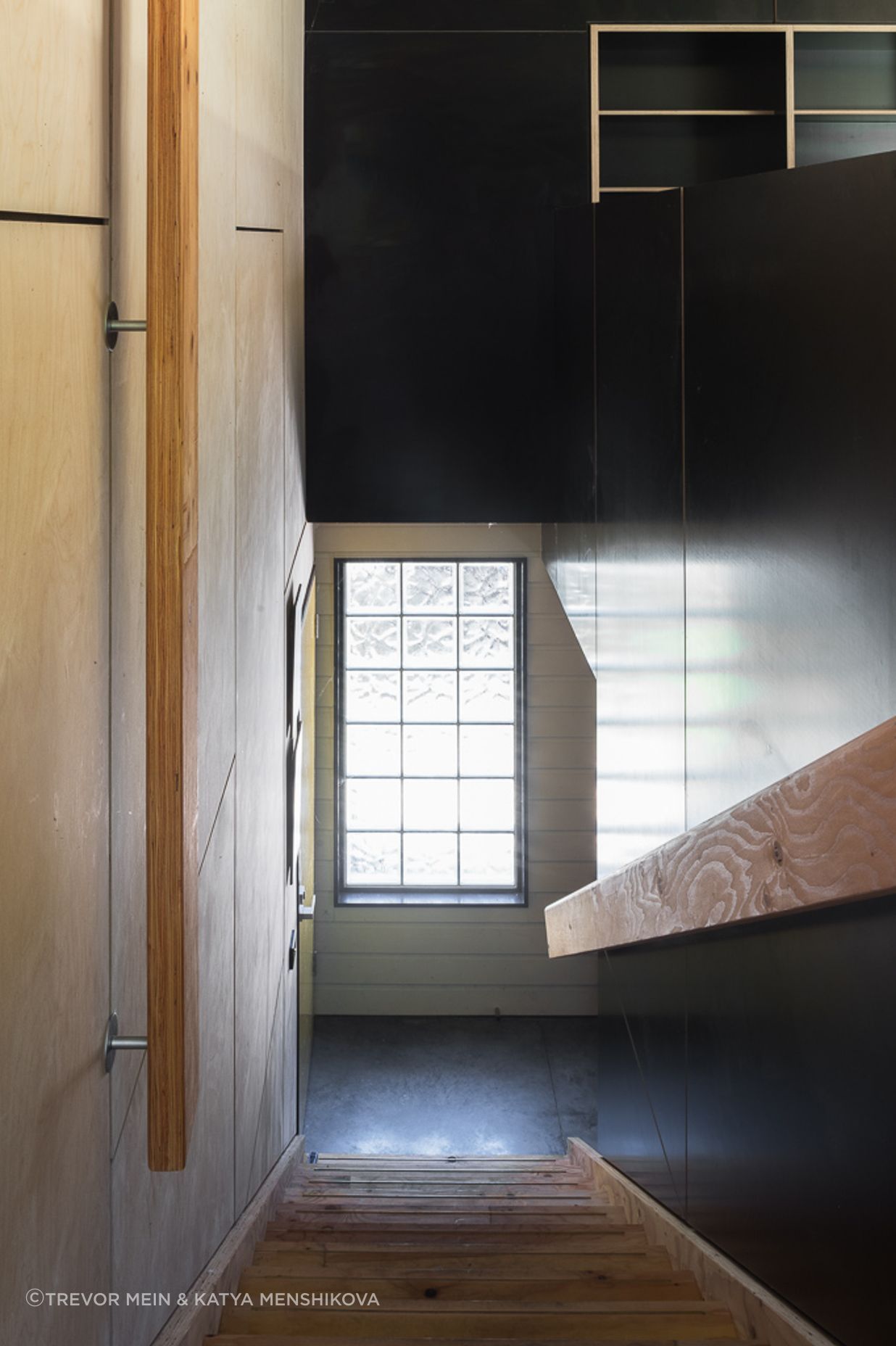 Hardwood stairs, glass brick window, Shoreham Studio