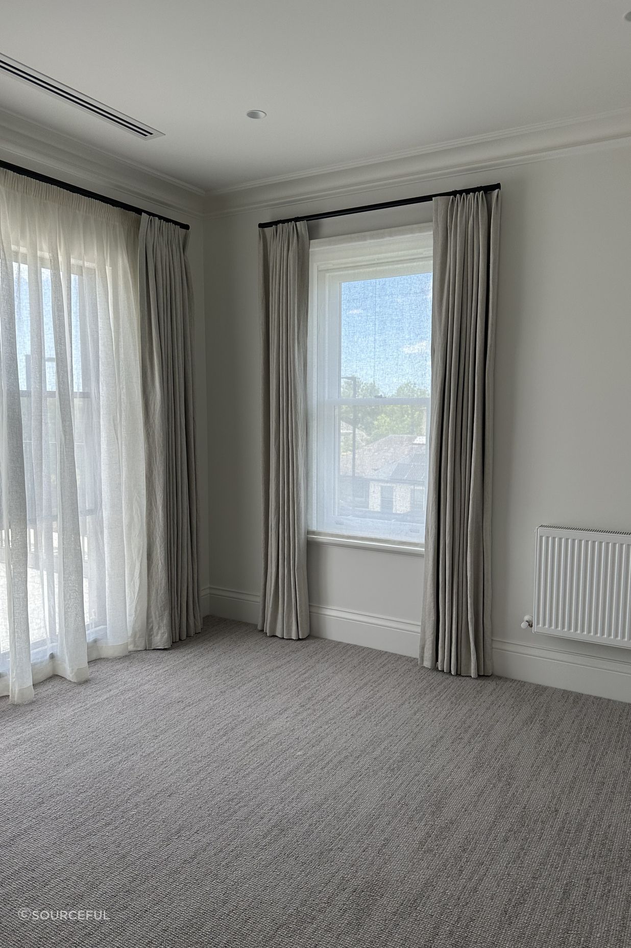 Childrens Bedroom - Featuring automated rods with linen curtains and a sheer roman blind