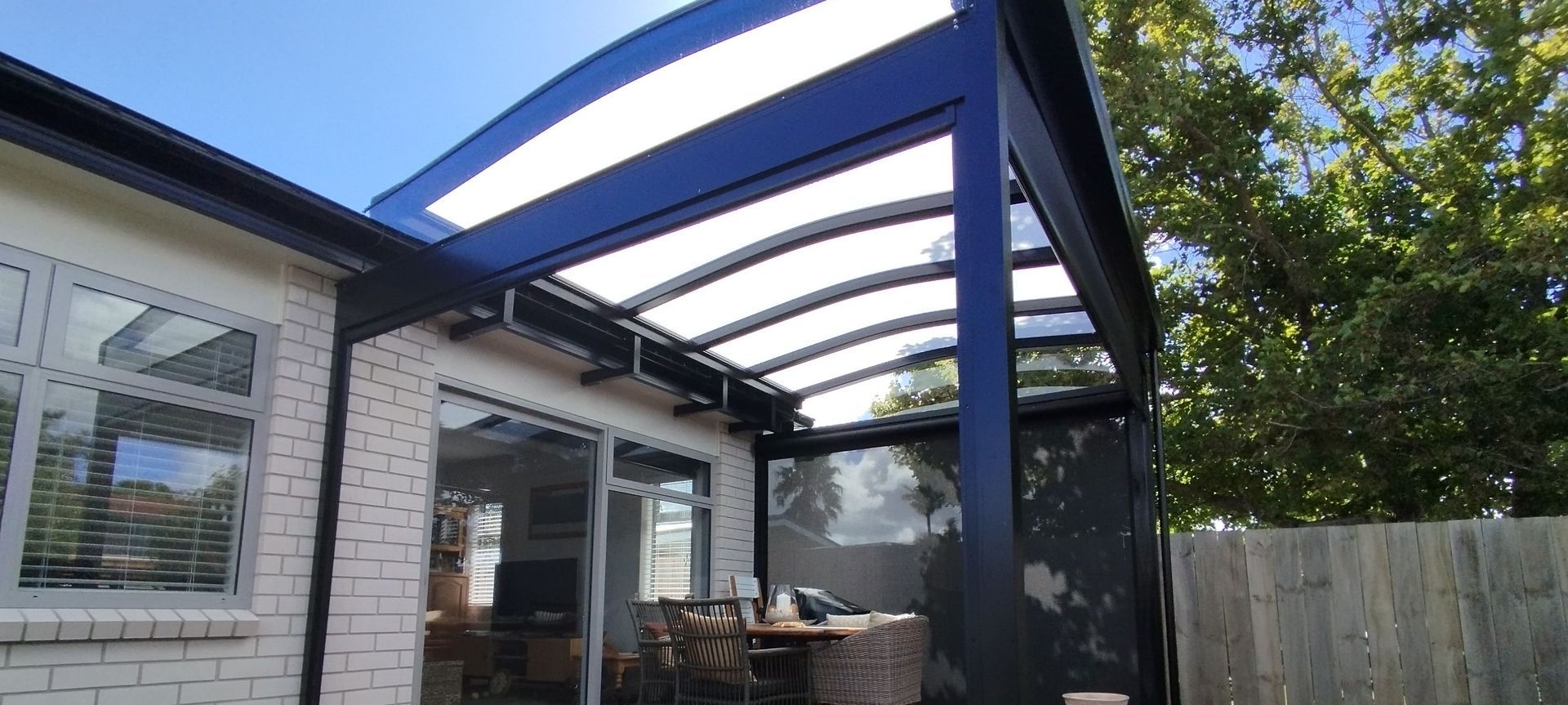 Gable Roof Canopy with Ziptrak® Outdoor Blinds in Orewa banner