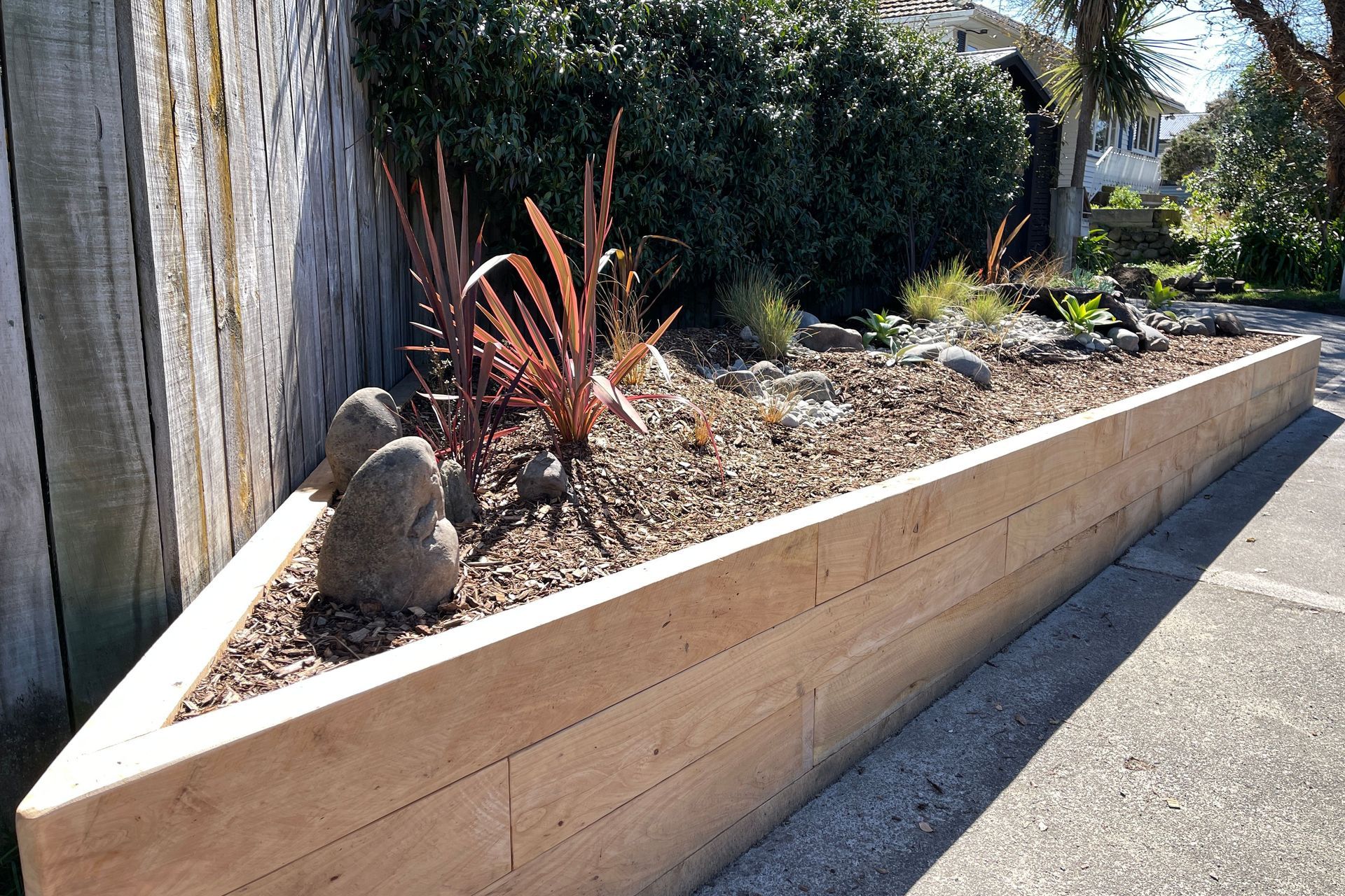Raumati Beach - Angled Macrocarpa Garden Bed