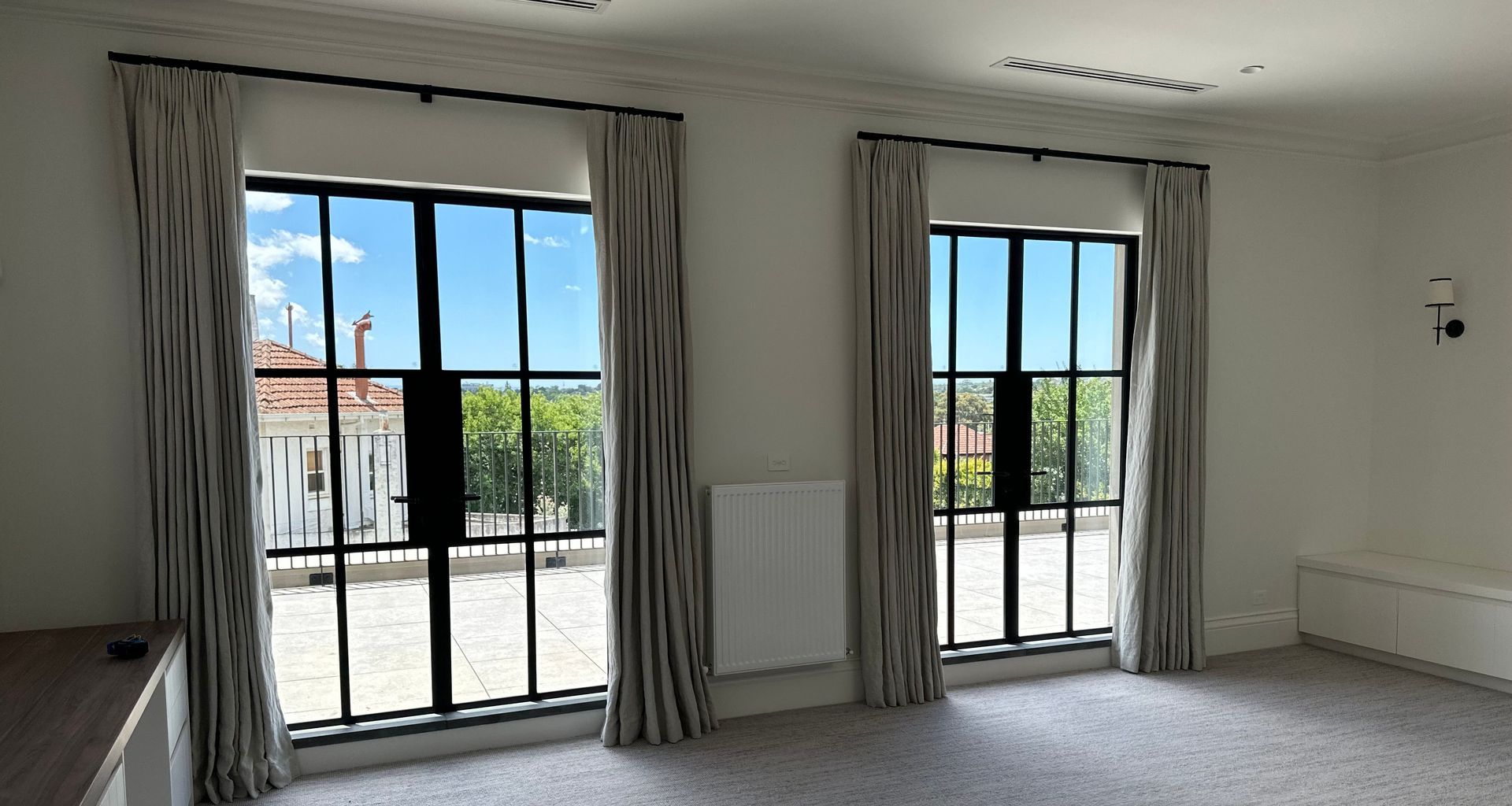 Landing area - Featuring automated rods and European linen drapes.
