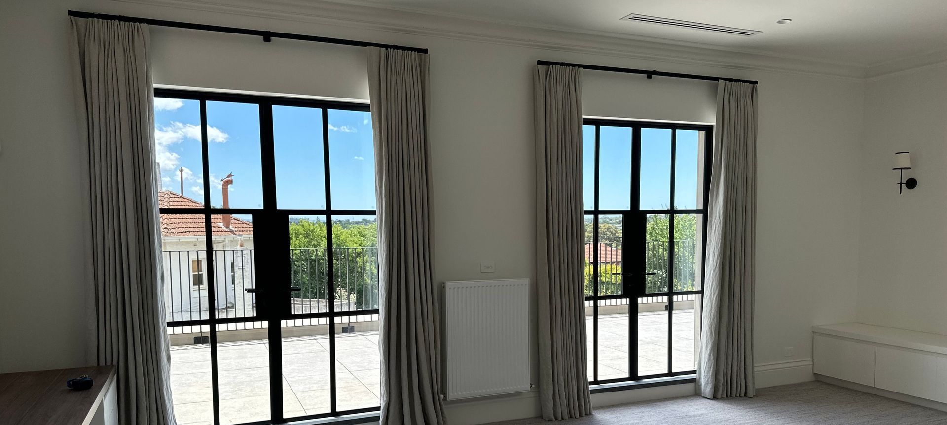 Landing area - Featuring automated rods and European linen drapes.