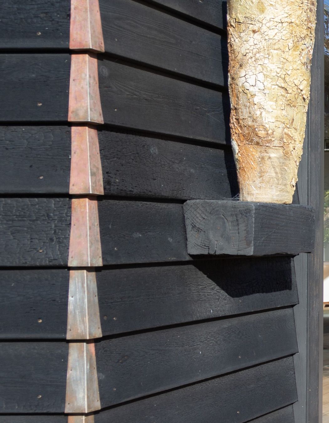 Anagama Fired Clay Pot Light Adorn the Exterior To Compliment the Japanese Exterior