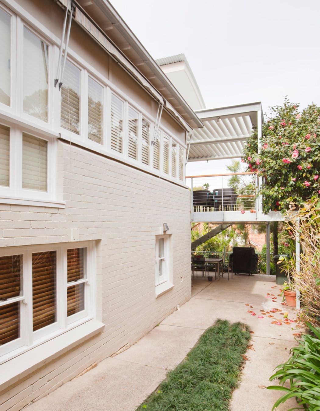 View from side driveway also showing existing dwelling