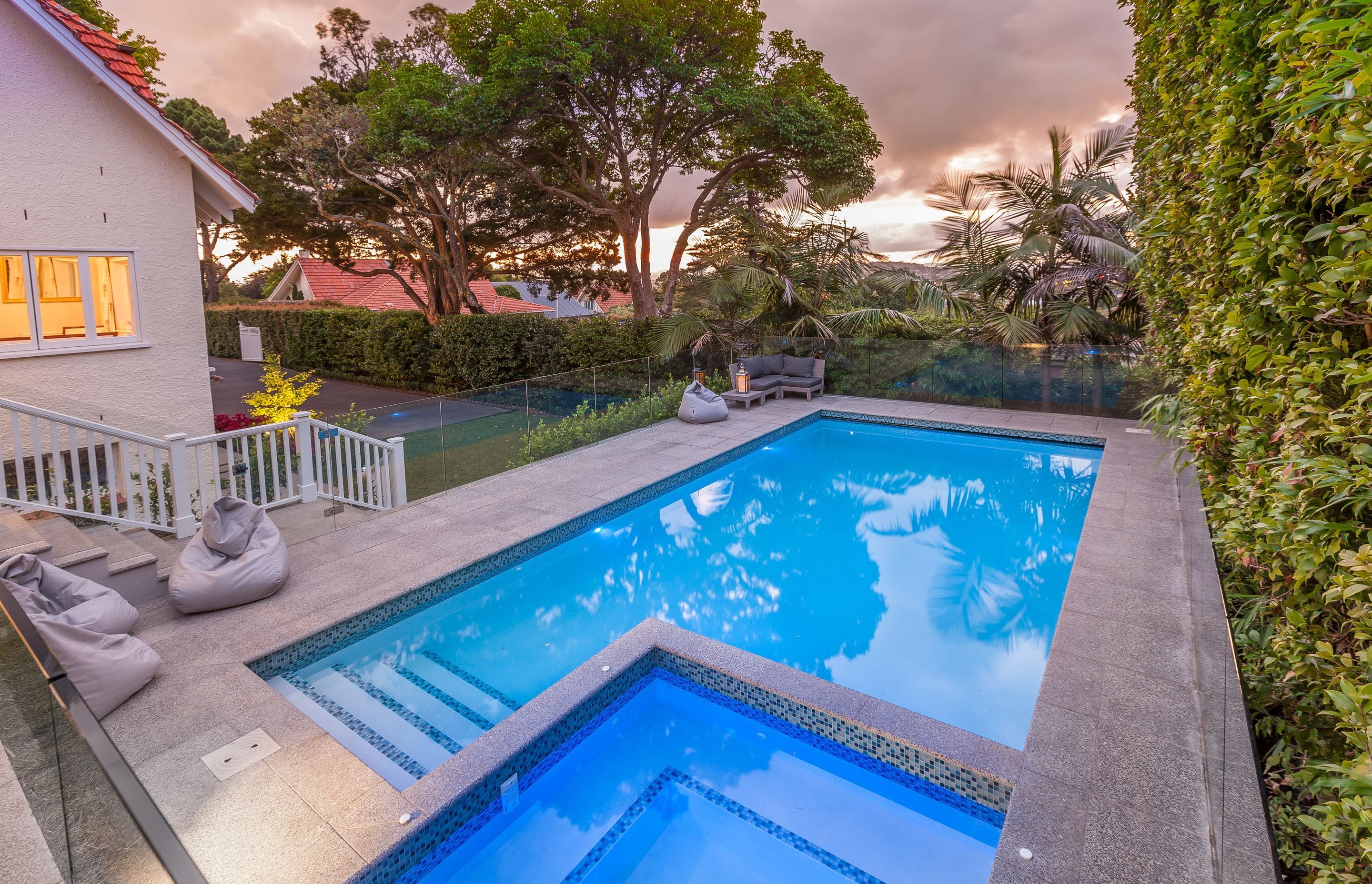 Pool &amp; Spa at Dusk - Hydrazzo Gulfstream Blue from SSL Distributors 
Tiles - Independent Ceramics Crystal Blue Mix