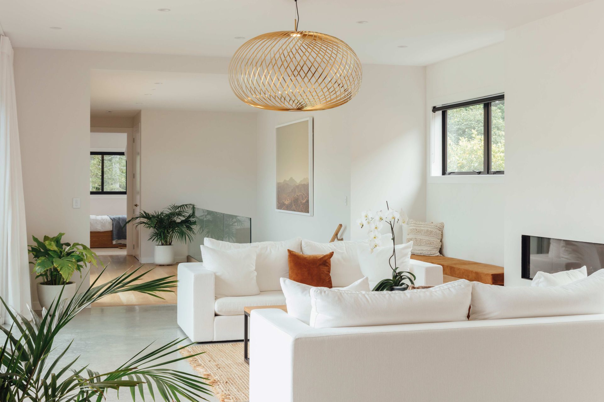 To create a number of dedicated spaces for family members to retreat to, three living areas have been incorporated throughout the home; one on each level.