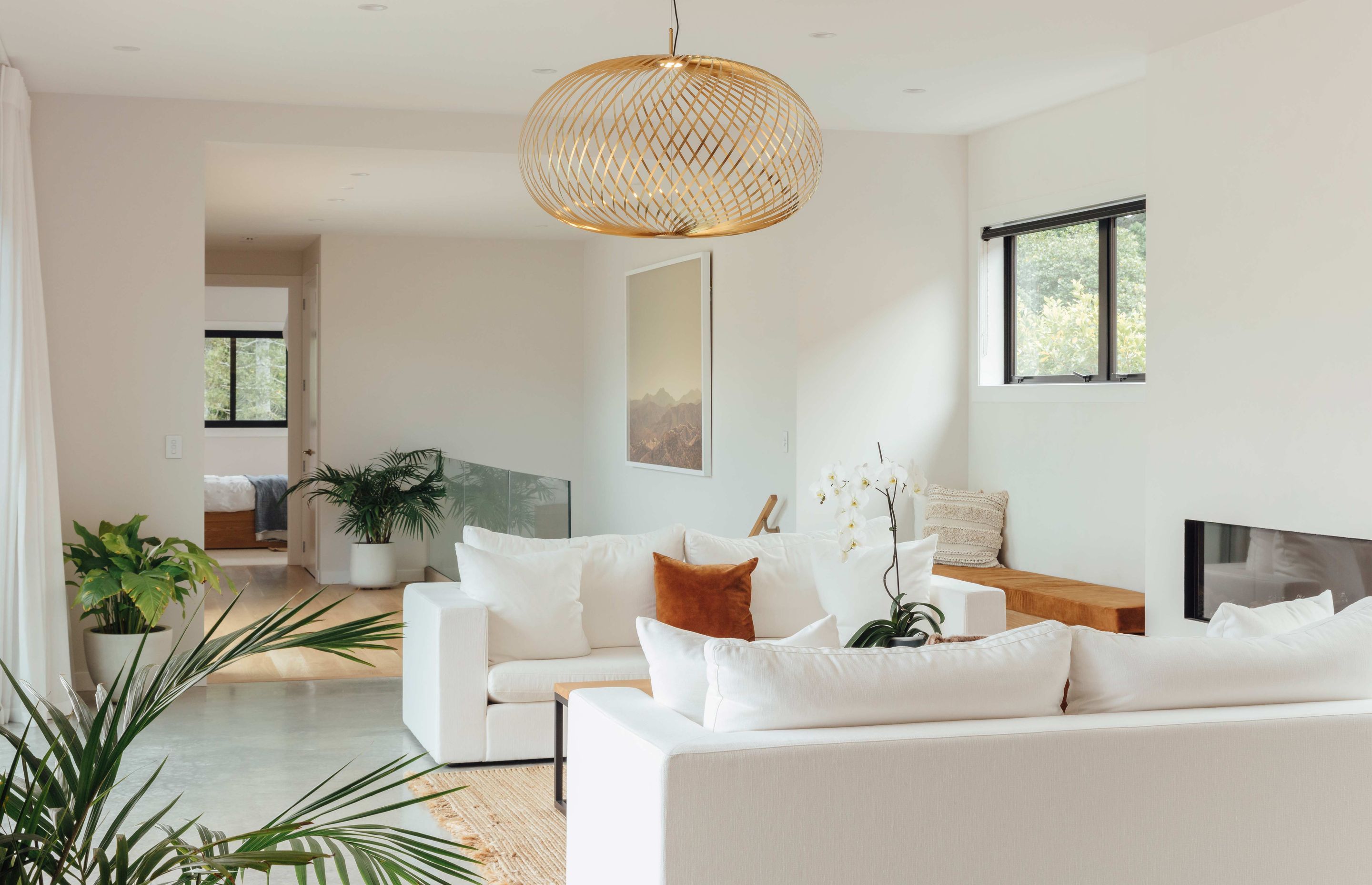 To create a number of dedicated spaces for family members to retreat to, three living areas have been incorporated throughout the home; one on each level.