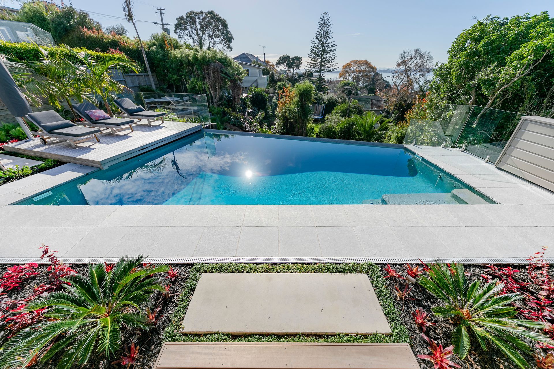 A real place to relax at home whether in the pool, or poolside.