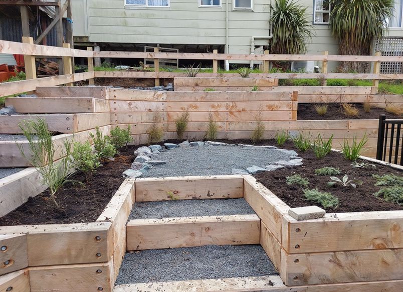 Maximising space and views on small, steep seaside section