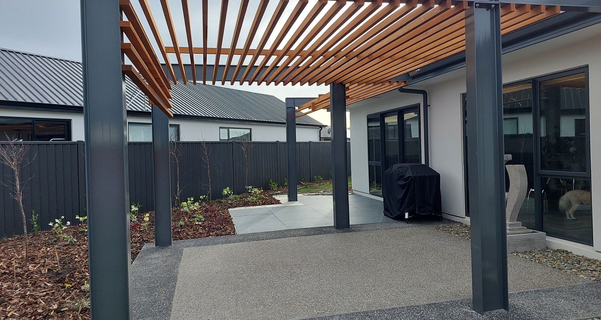 Pergola in urban setting balances light and shade banner