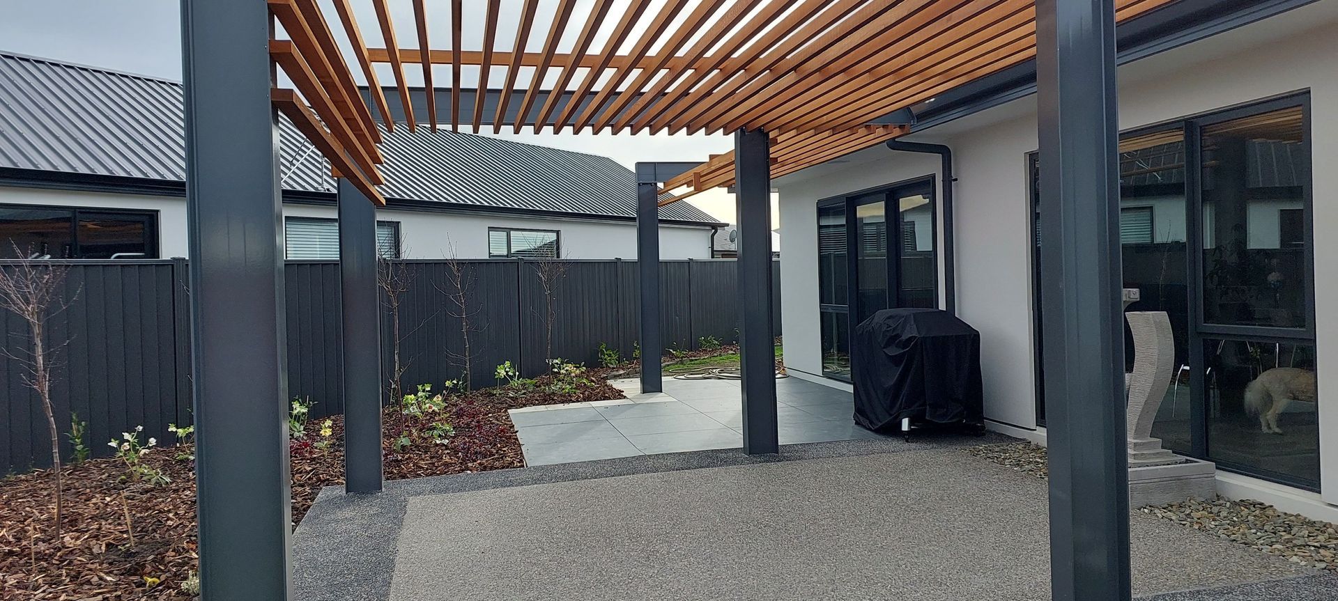Pergola in urban setting balances light and shade banner