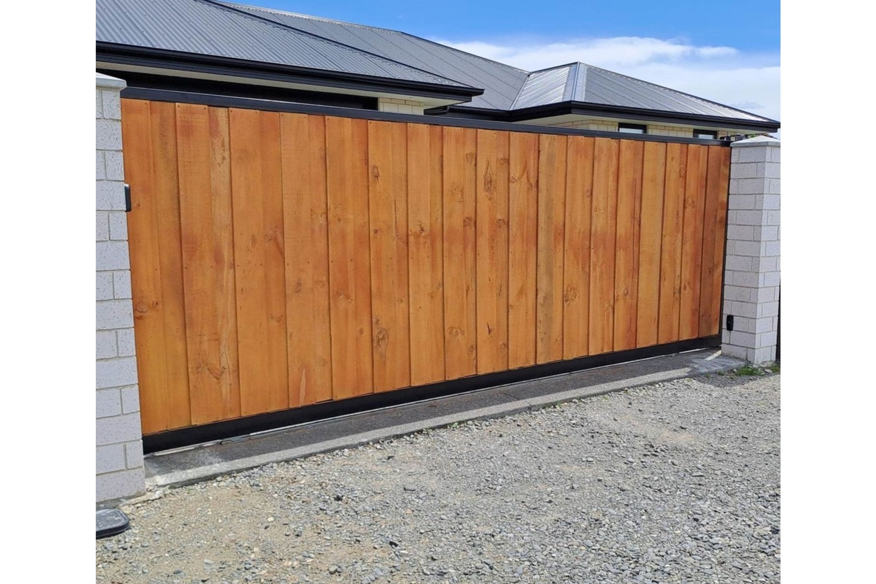 Bgates-Timber-Clad-Sliding-Gate-ArchiPro.jpg