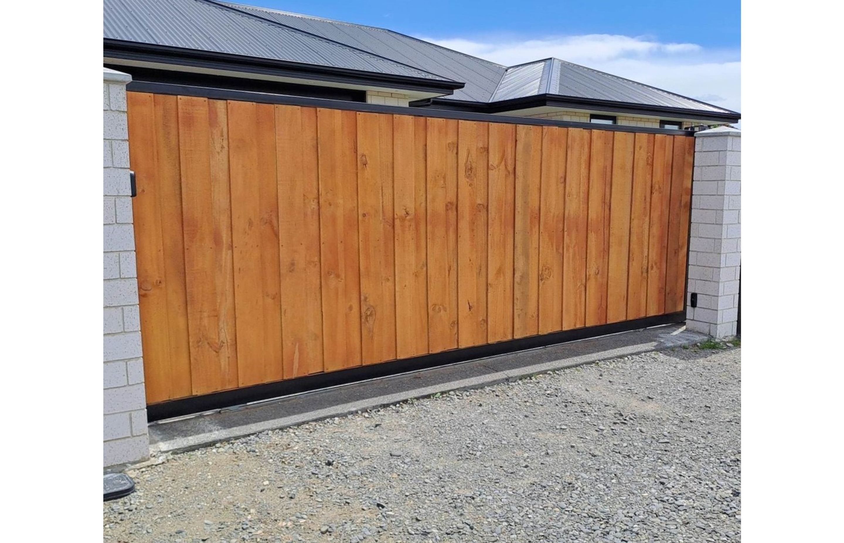 Bgates-Timber-Clad-Sliding-Gate-ArchiPro.jpg