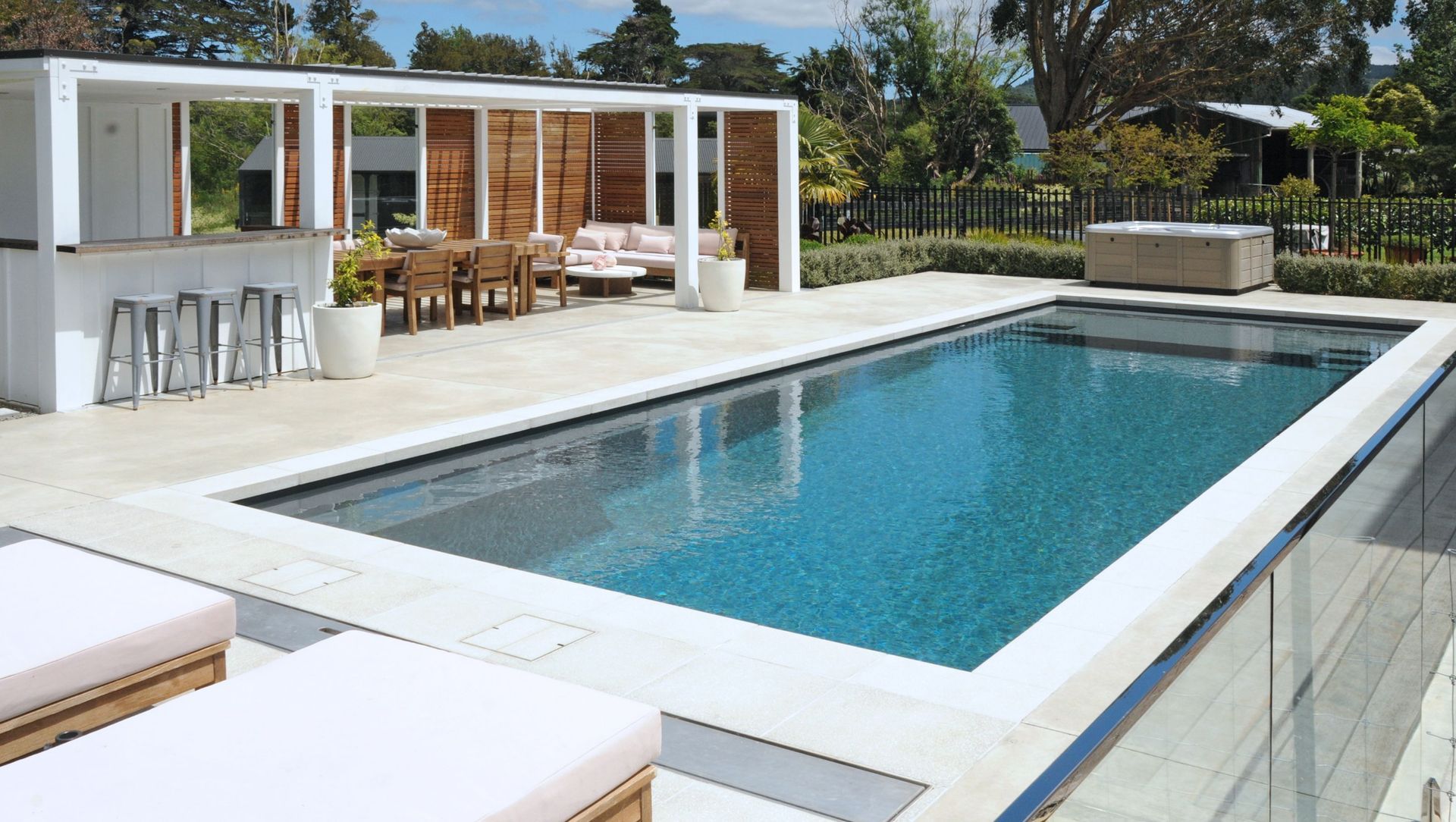Fibreglass Pool with Horizon International Paving banner