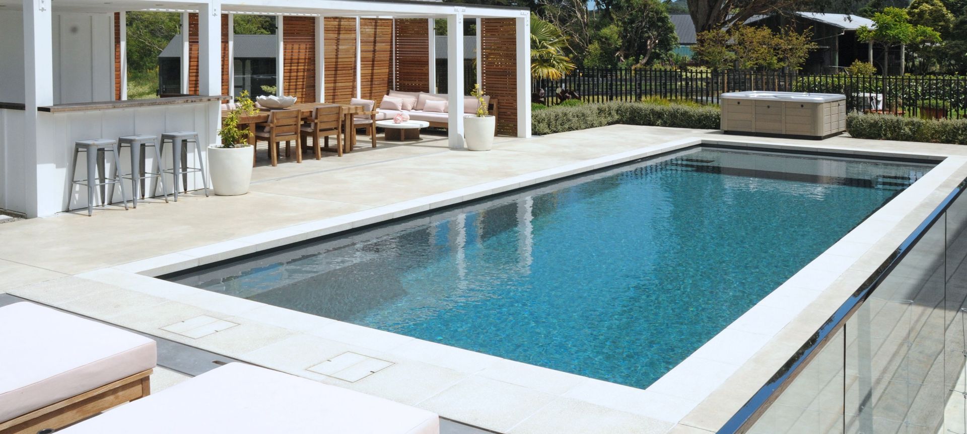Fibreglass Pool with Horizon International Paving banner