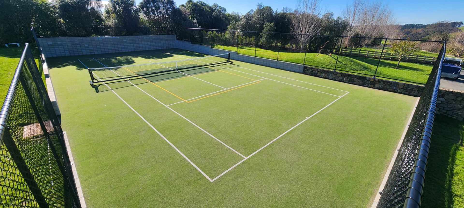 Serving Excellence: A Private Tennis Court Transformation in Matakana banner