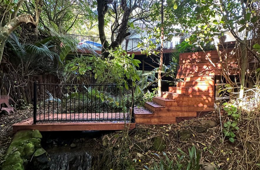 Deck Integrated with Native Bush and Built Over a Stream