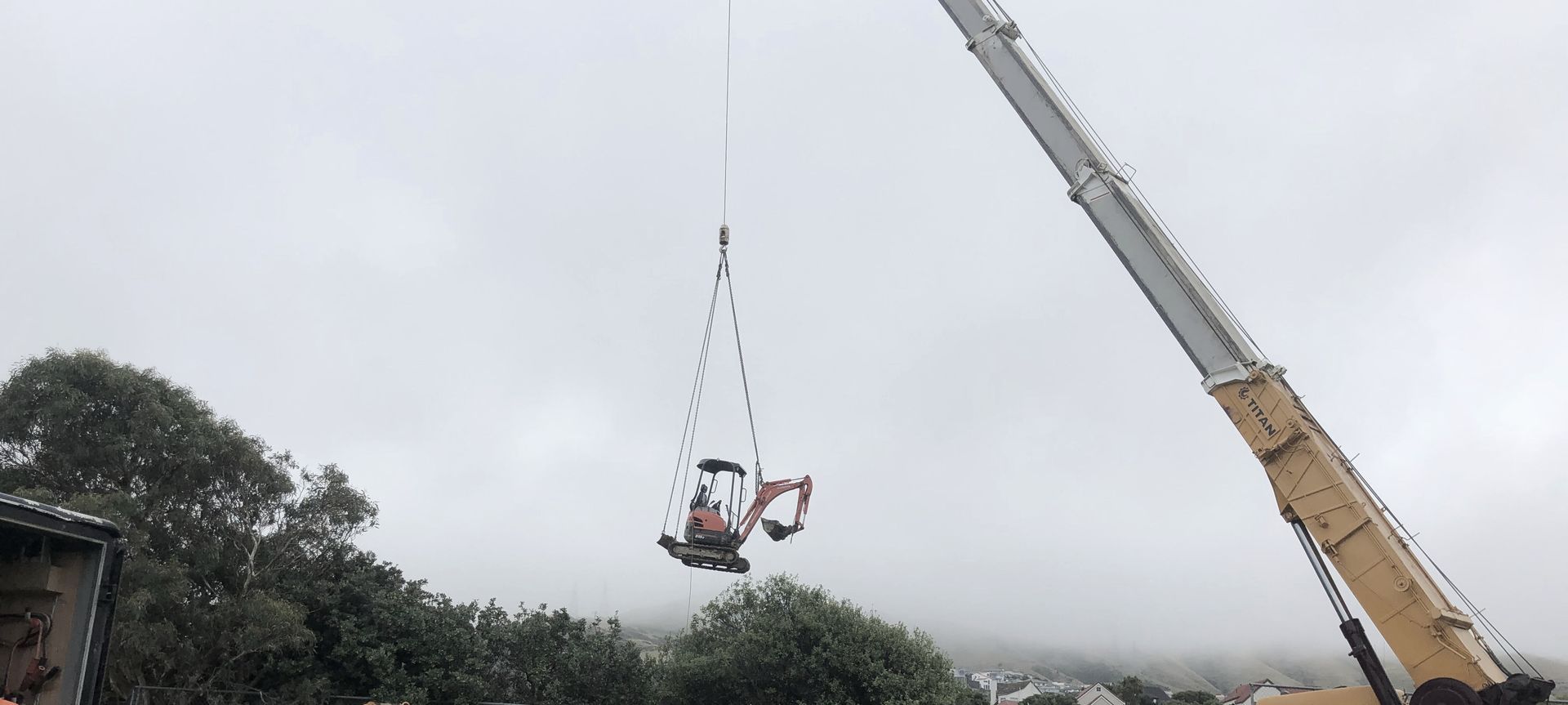 Helicopter - Crane lifts banner